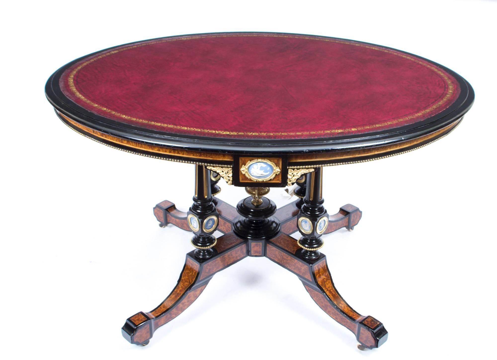 We are very pleased to be able to offer for sale this Victorian Antique Library Table or Centre Table with Jasperware Plaques dating from around 1880.     

This Antique Library Table has been very skillfully made by an accomplished craftsman using