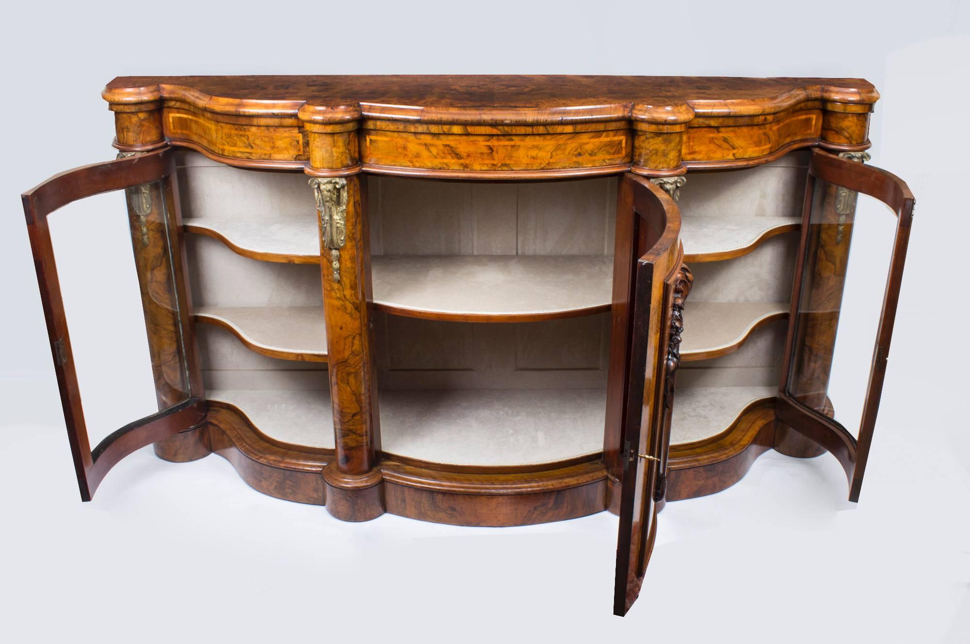This is a superb antique Victorian burr walnut and marquetry credenza, circa 1860 in date.

Oozing sophistication and charm, this credenza is the absolute epitome of Victorian high society. 

The entire piece highlights the unique and truly