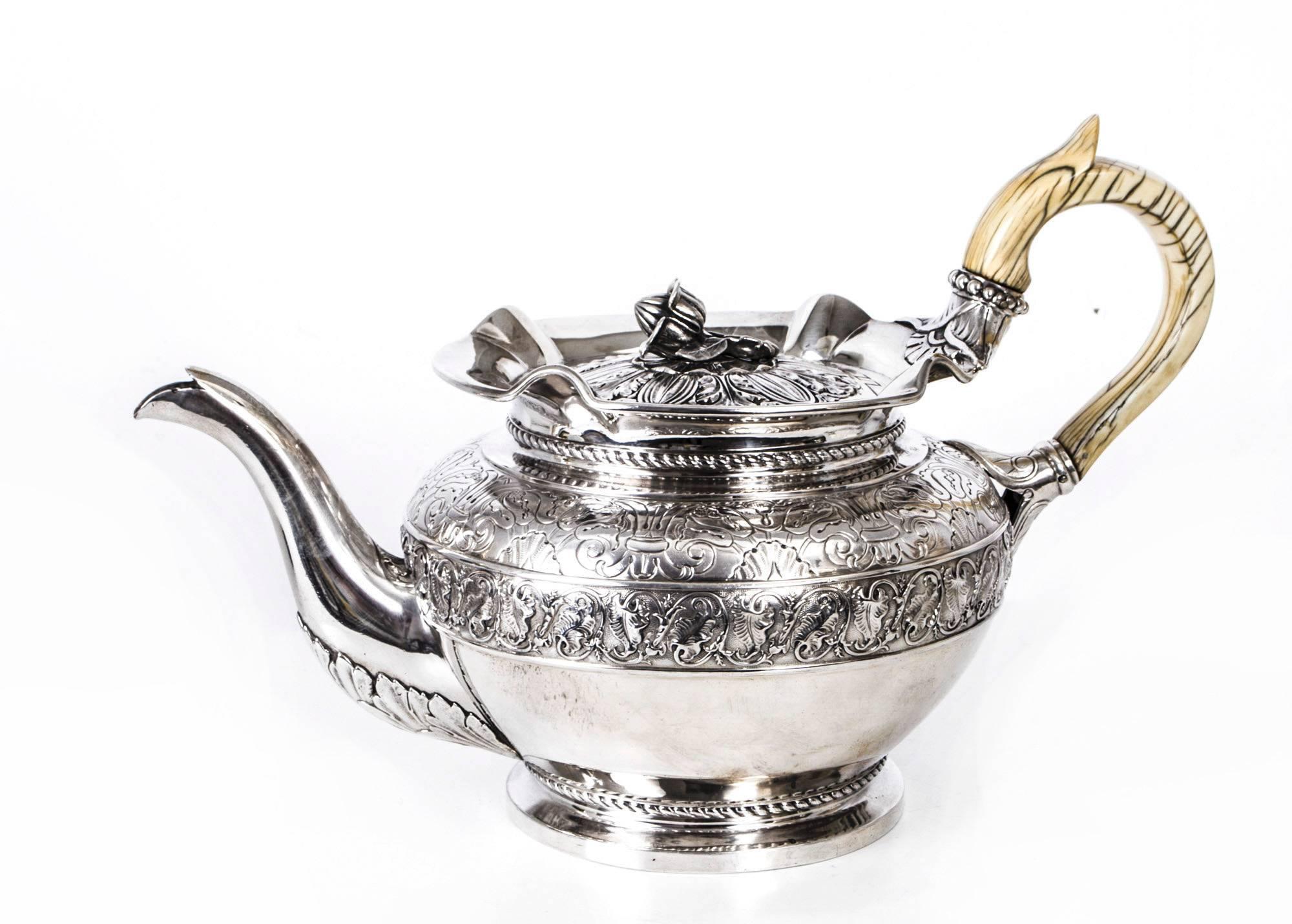 This is a really superb antique sterling silver teapot with hallmarks for London 1825 and the makers mark of one of the most celebrated silversmiths of all time, John Bridge.

With chased and engraved classical foliate decoration typical of his