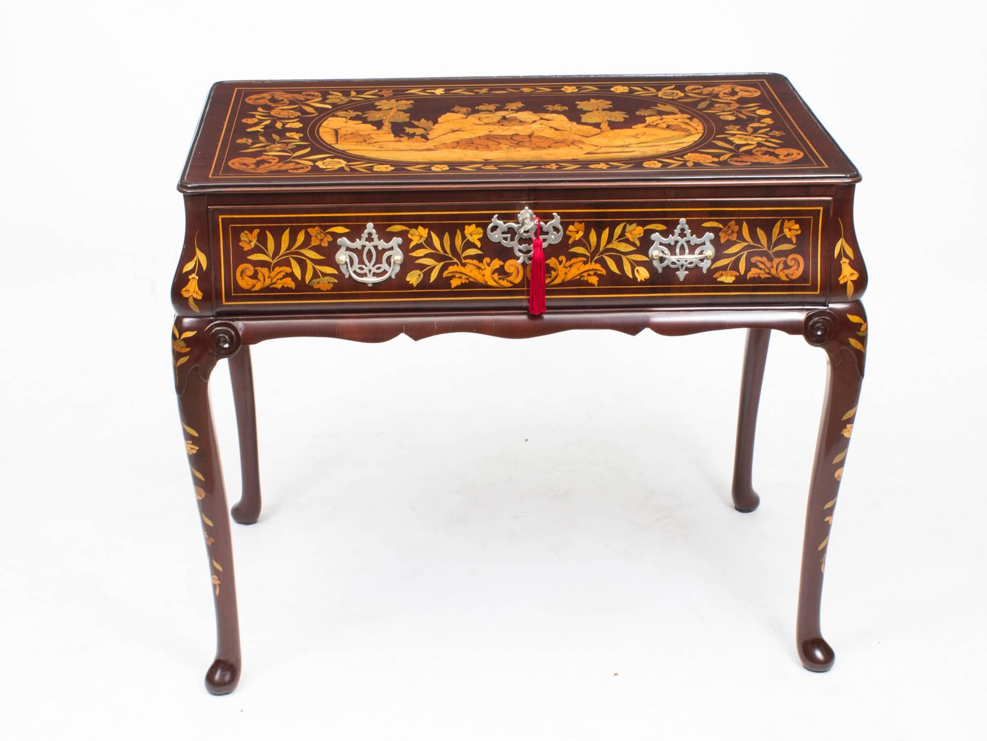 This is a beautiful antique Dutch marquetry side table, circa 1780 in date.

It is in fantastic condition and we have cleaned and French polished it to bring back it's original splendour.

It is handcrafted from Cuban mahogany with a wonderful