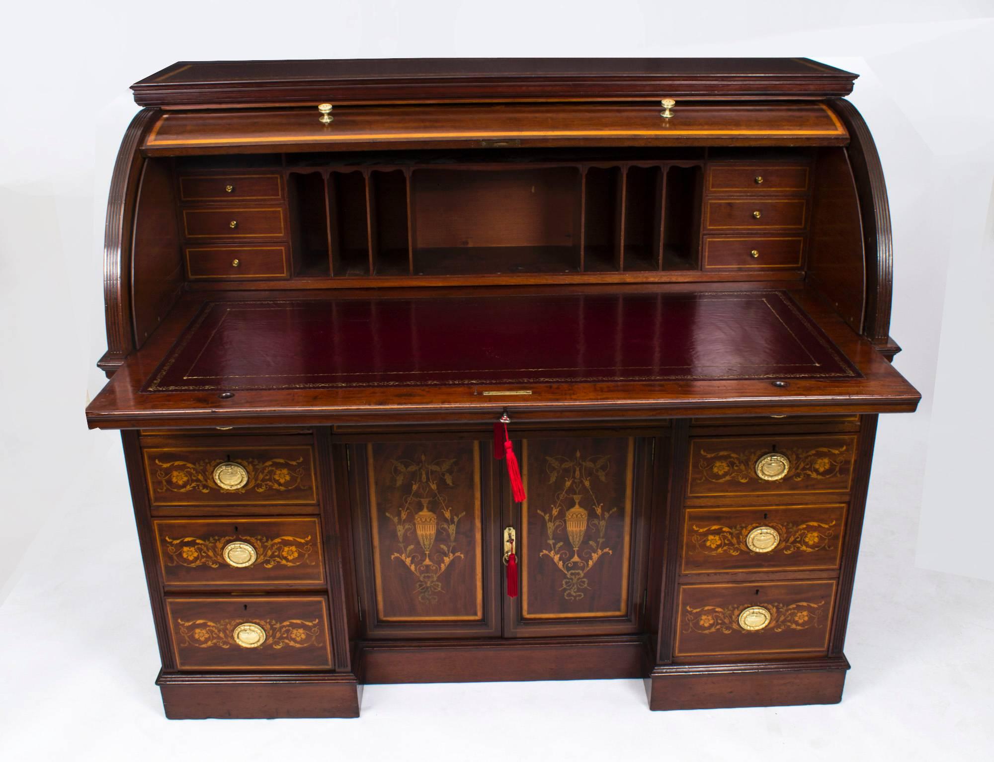 Here we have a very large and impressive late Victorian cylinder bureau made by the well-known and much sought after Victorian cabinet maker and retailer Edwards & Roberts of Wardour Street, London.

Our antique furniture experts have dated this