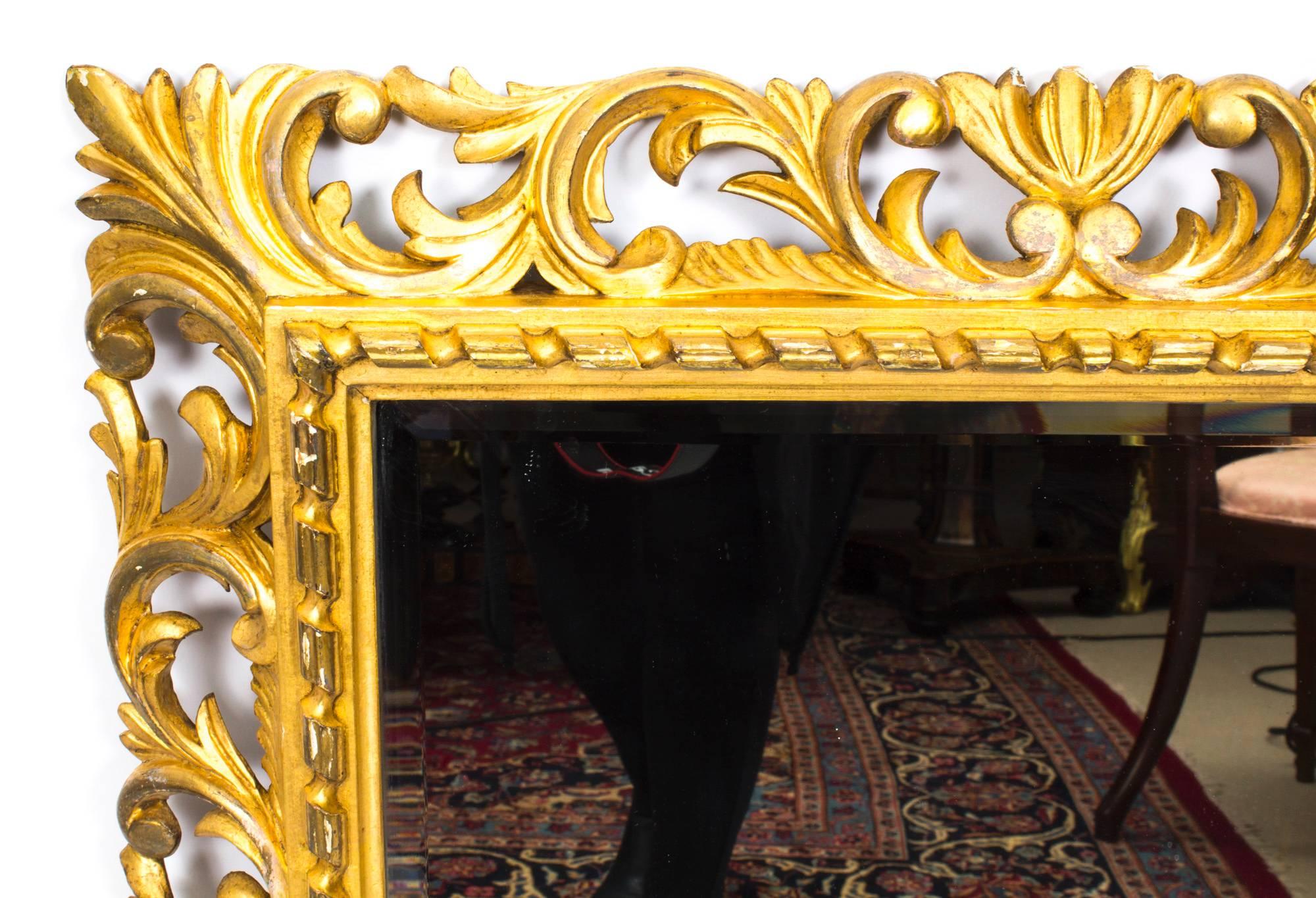 Early 20th Century Antique Elaborate Gilded Hand Carved Florentine Mirror, circa 1900