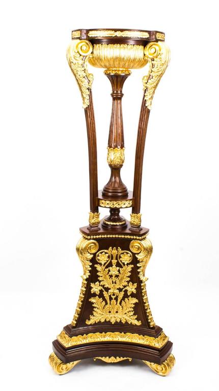 Pair of Mahogany Empire Style Giltwood Carved Torchers 20th C In Excellent Condition For Sale In London, GB