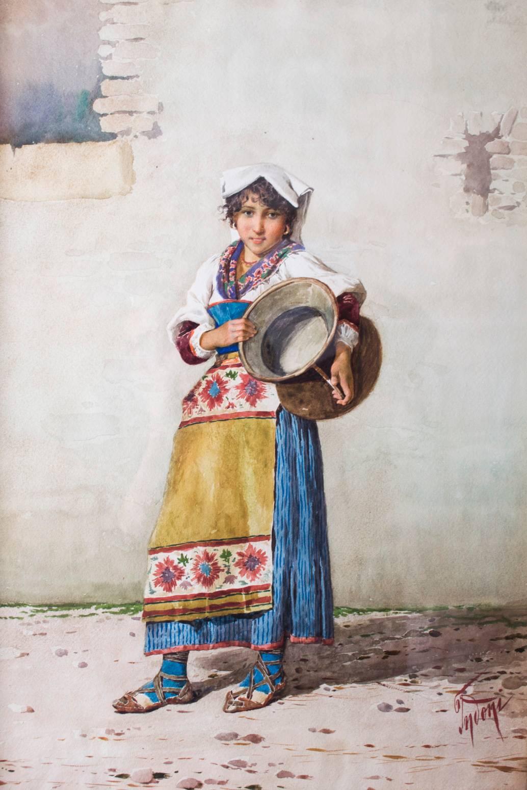 This is a beautiful antique watercolour study 'Water Carrier' by Filippo Indoni, circa 1890.

It is the study of a young female figure with water carrier, standing in a street, signed bottom right, in a beautiful glazed gilt frame.

The colours are