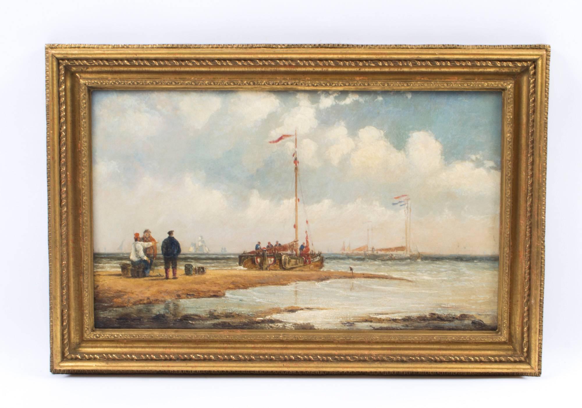 This is a delightful pair of oil on canvas seascapes of beaches, circa 1850 in date.

This delightful pair is skilfully painted in the English school; the first features a scene with fishermen on a beach with boats sailing on the horizon.

The