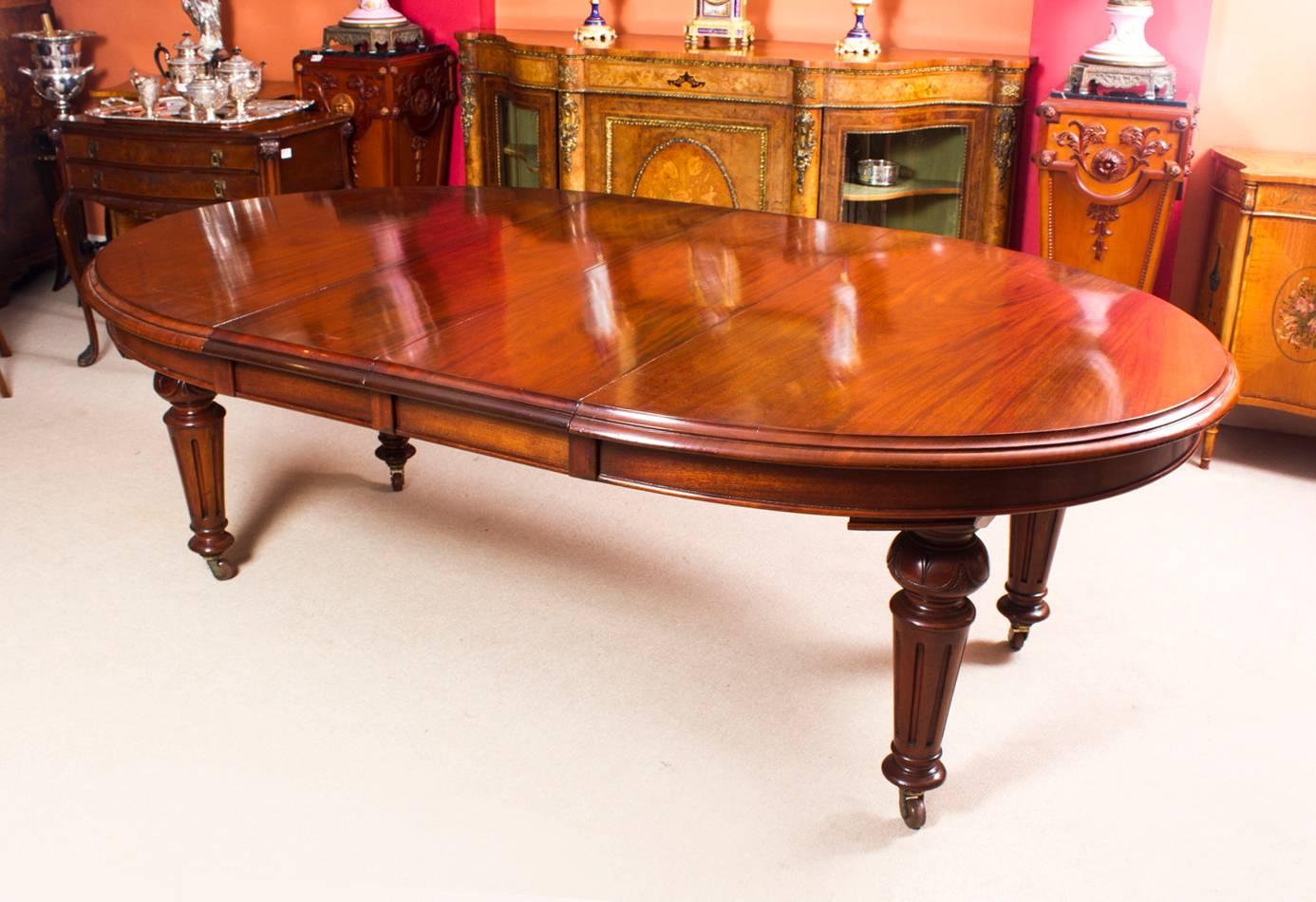 This is a fabulous dining set comprising an antique Victorian mahogany oval extending dining table, circa 1860 in date with a set of eight Victorian style balloon back dining chairs.

The table has two original leaves and has been handcrafted from