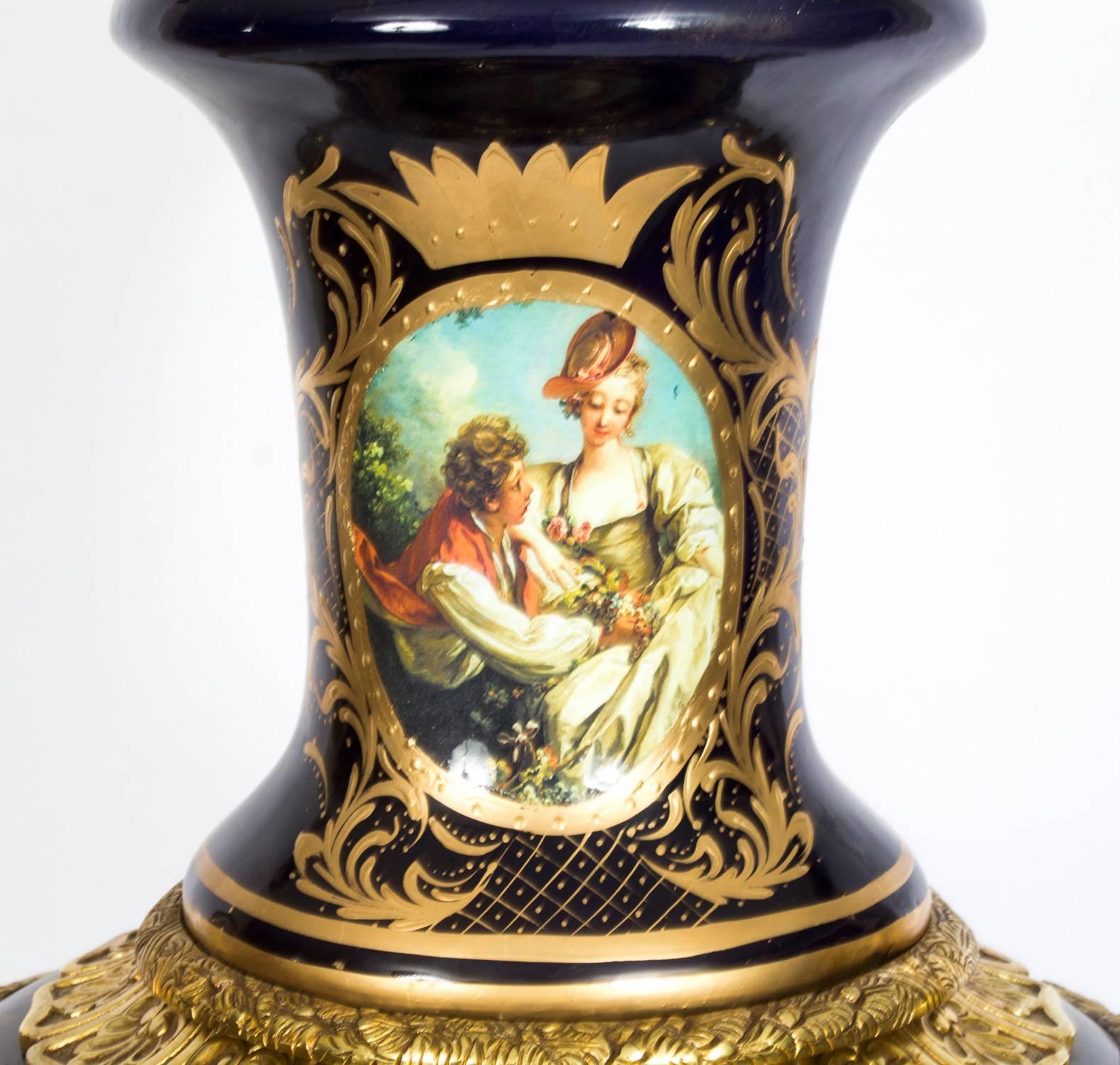 Pair Of Huge Gilded French Sevres Style Blue Porcelain Vases Pair Of Huge Gilded French Sevres Style Blue Porcelain Vases