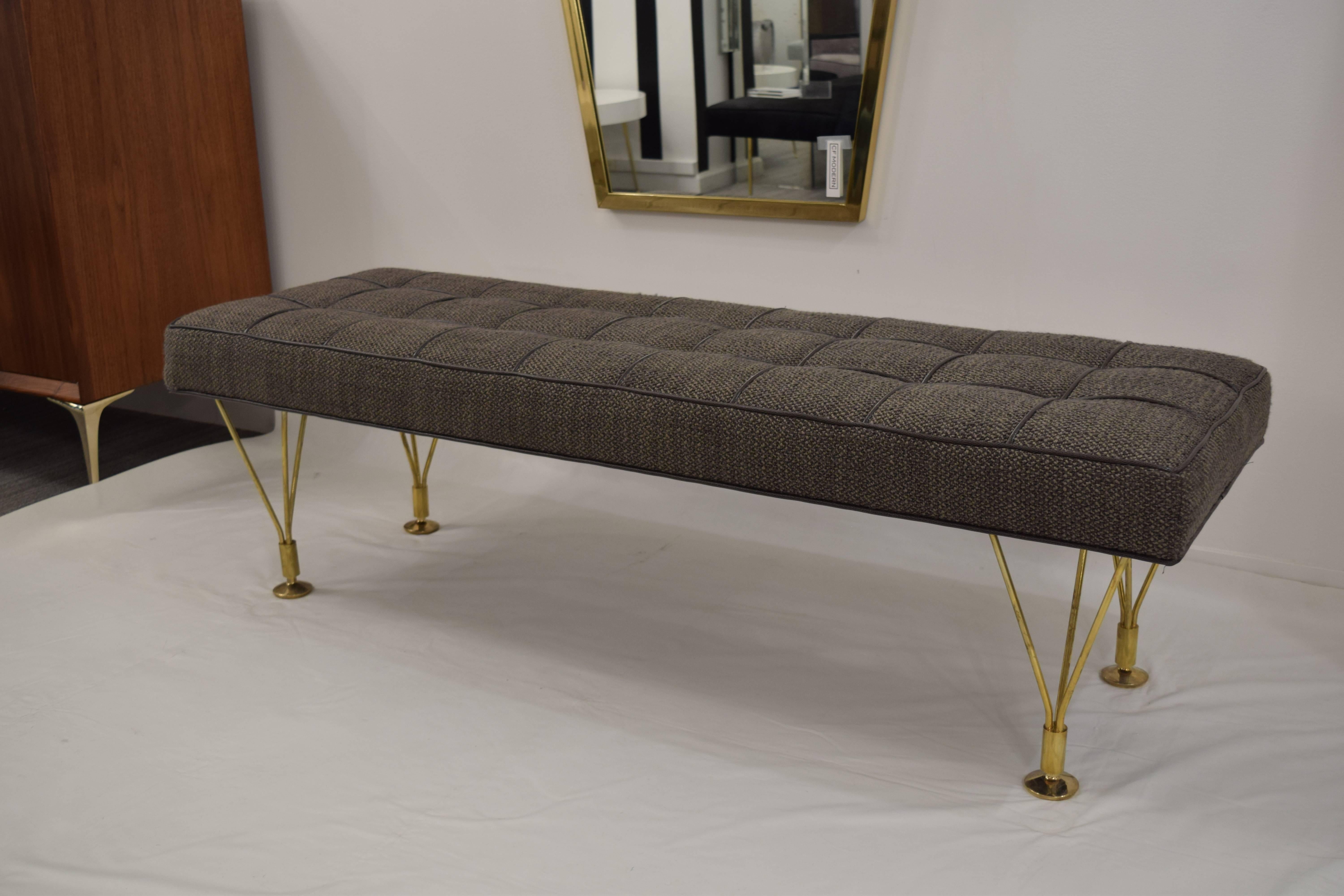 The martini bench designed by Irwin Feld Design for CF Modern. Featuring four hand cast, hand polished solid brass 