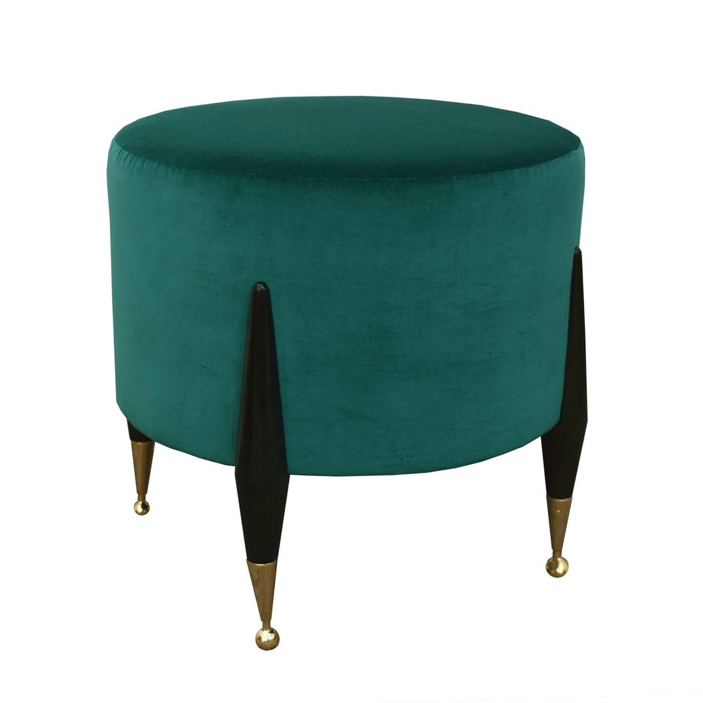 The mini imperial ball foot ottoman, designed by Irwin Feld Design for CF MODERN, is the smaller version of our full size imperial ball foot ottoman. The cylindrical cushion is upholstered in an exquisite teal velvet and stands out against the