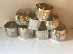 Group of Eight Art Deco Sterling Silver Napkin Rings. 