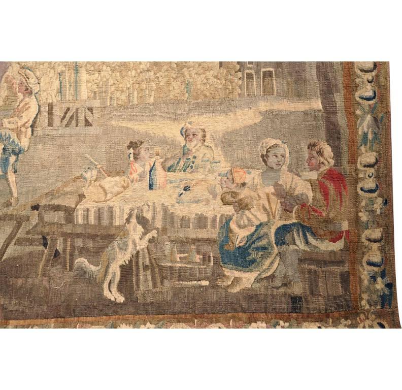 This elegant, antique tapestry was handwoven in the city of Aubusson, France, circa 1750. The iconic tapestry, 