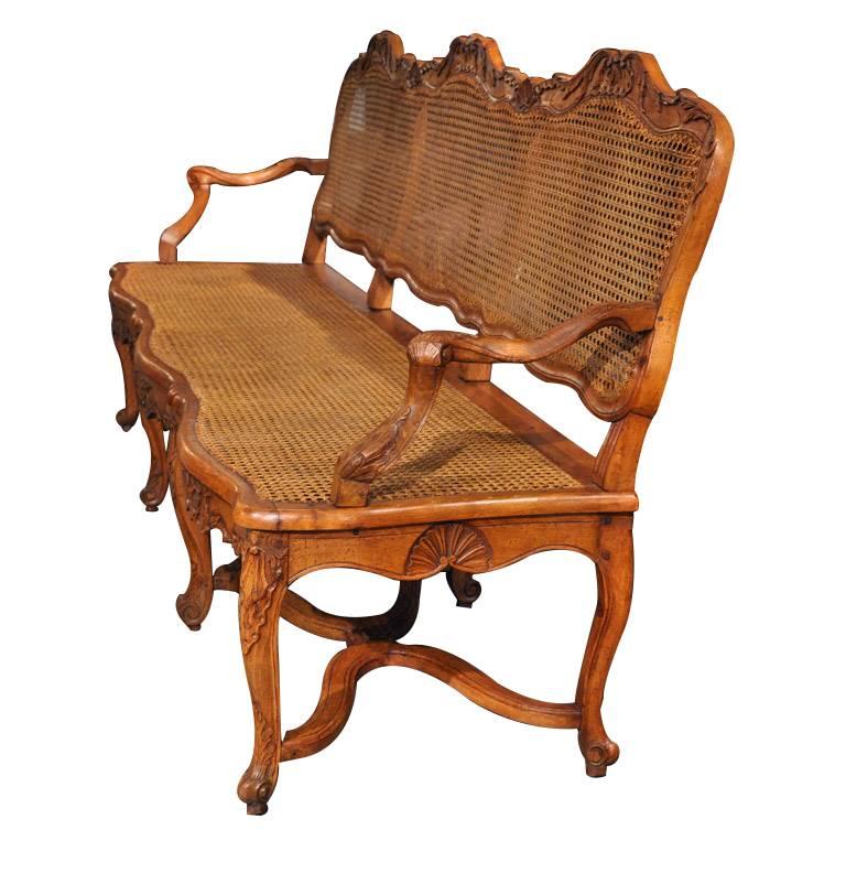 Caning 19th Century French Louis XV Carved Walnut Settee with Seat and Back Cane