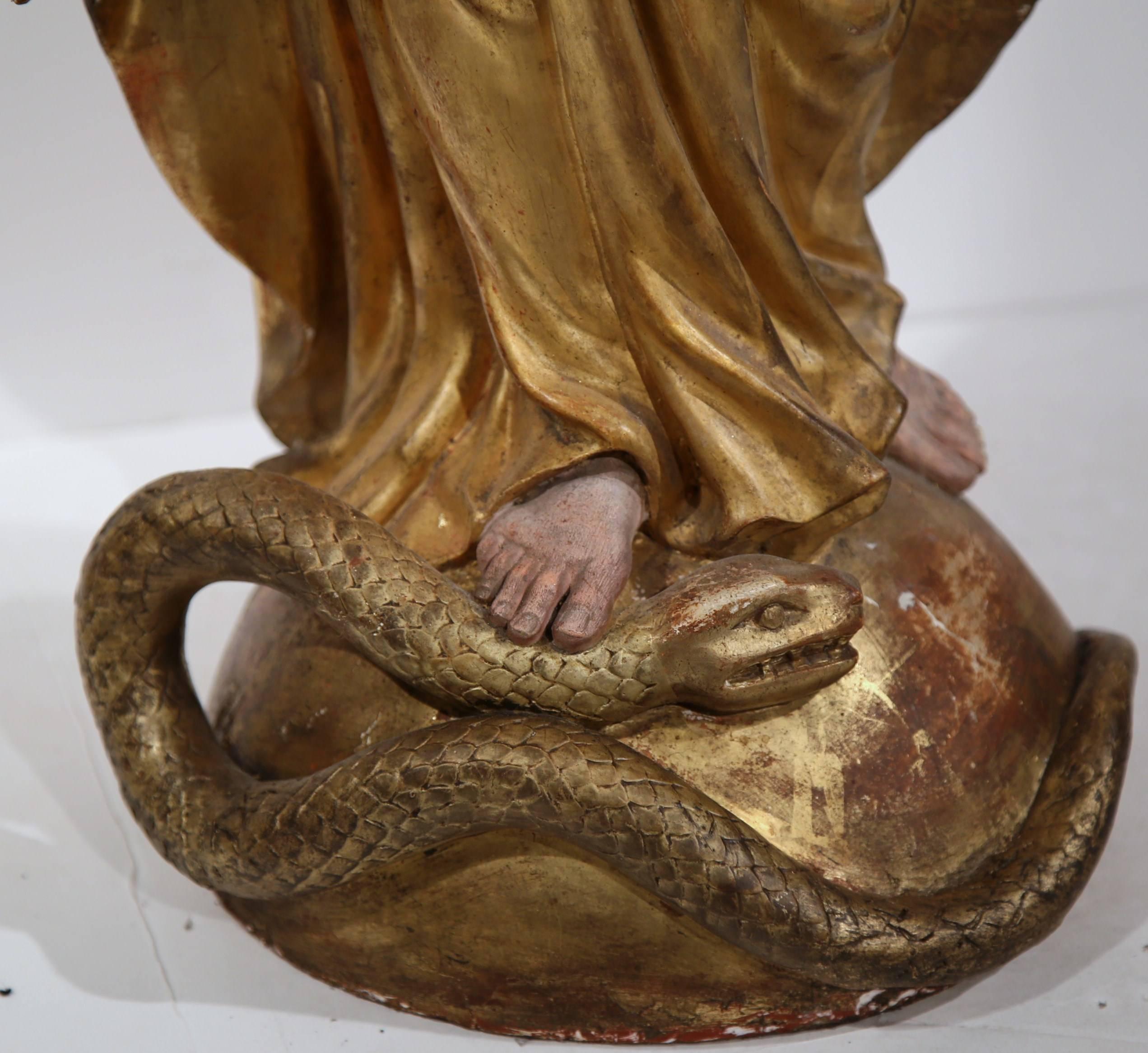 mary standing on serpent