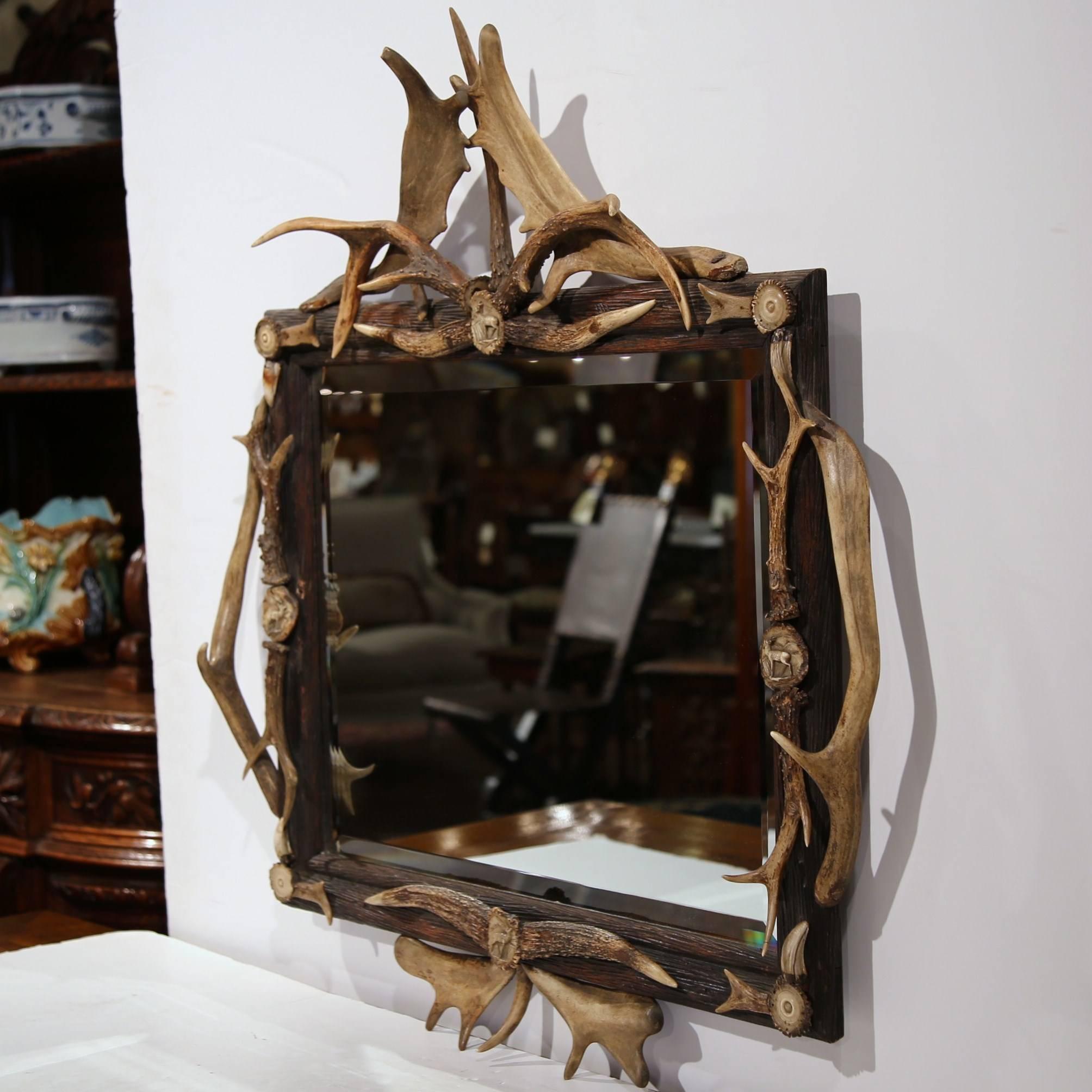 Swiss 19th Century Black Forest Mirror with Antlers and Carved Deer Medallions