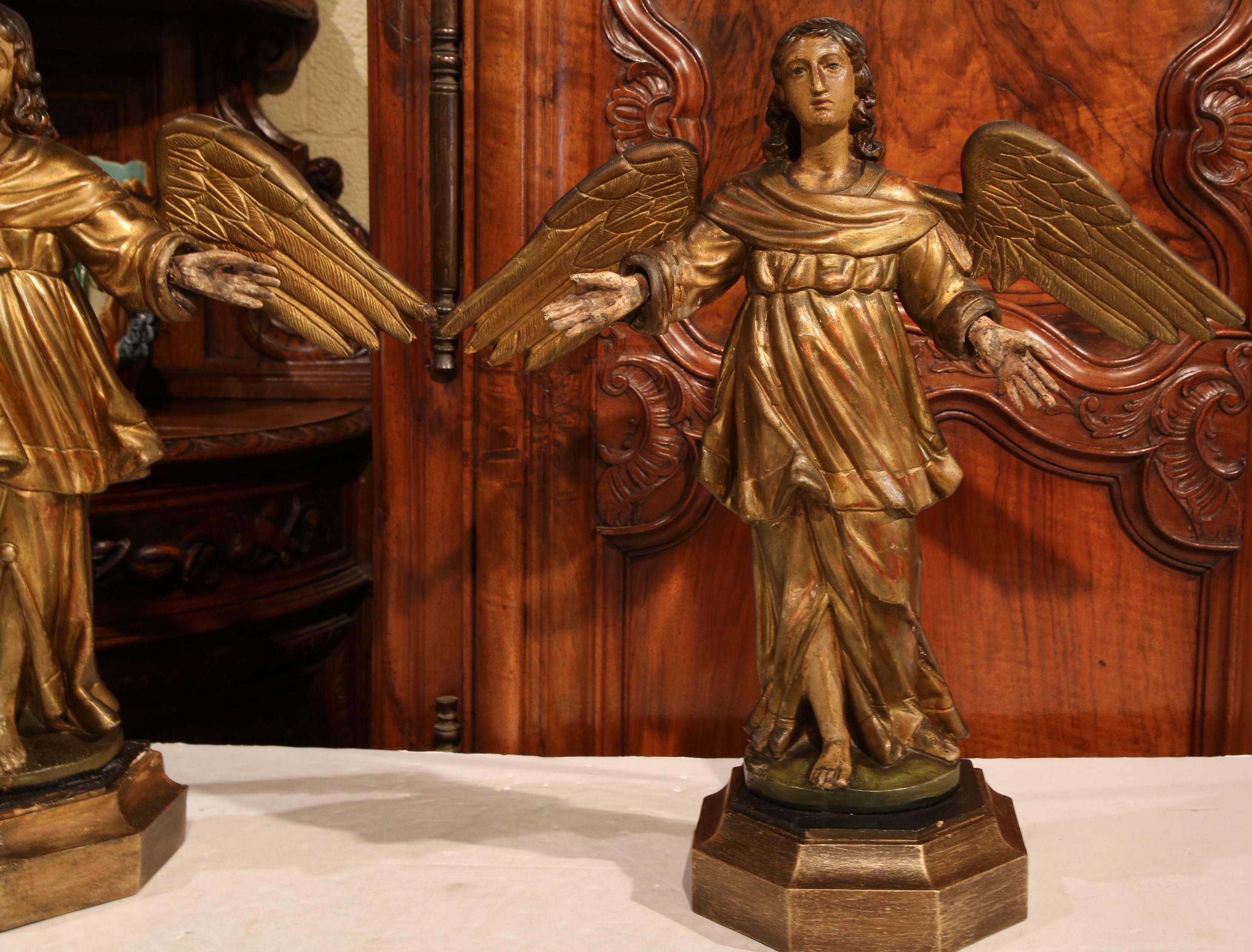 Classical Roman Pair of 19th Century, French Carved Gilt Winged Angels Statues