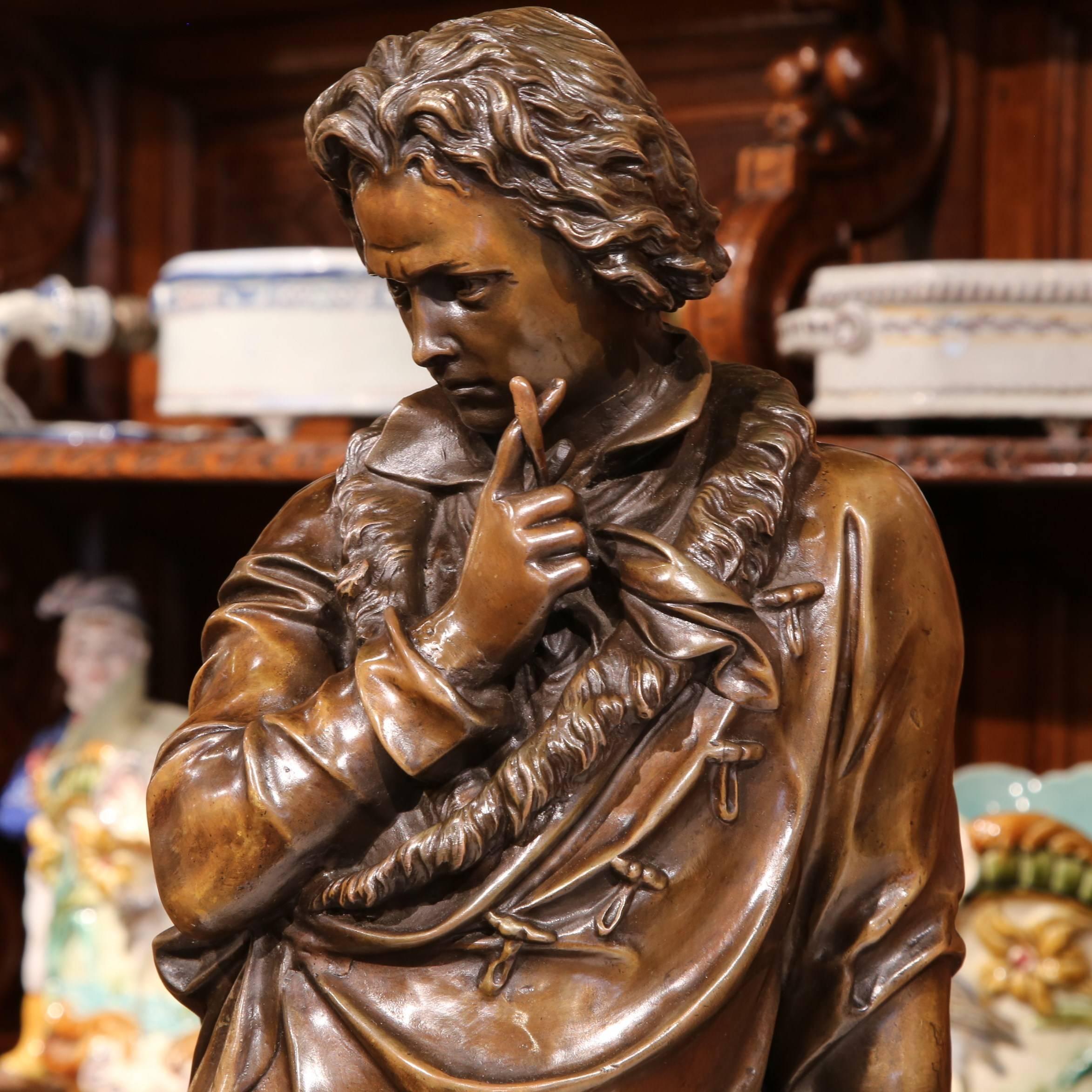This tall antique bronze sculpture was crafted in France, circa 1850. The large piece depicts the composer, pianist, and musical genius Ludwig Van Beethoven, and was created in the style of the French sculptor Andre Trupheme (1820-1888). The elegant