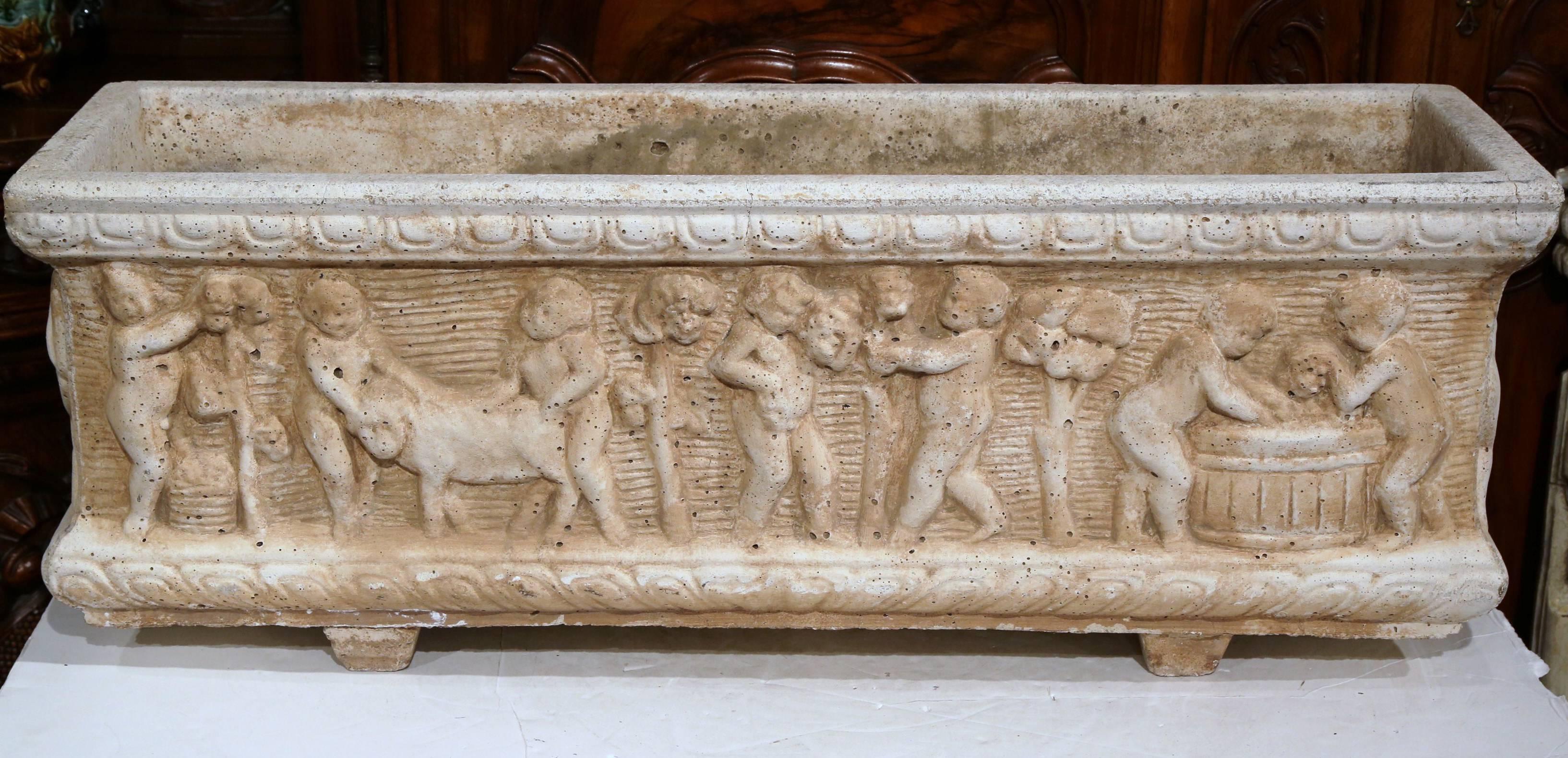 Cast Stone 19th Century French Carved Stone Jardinière with Figural Children Motifs