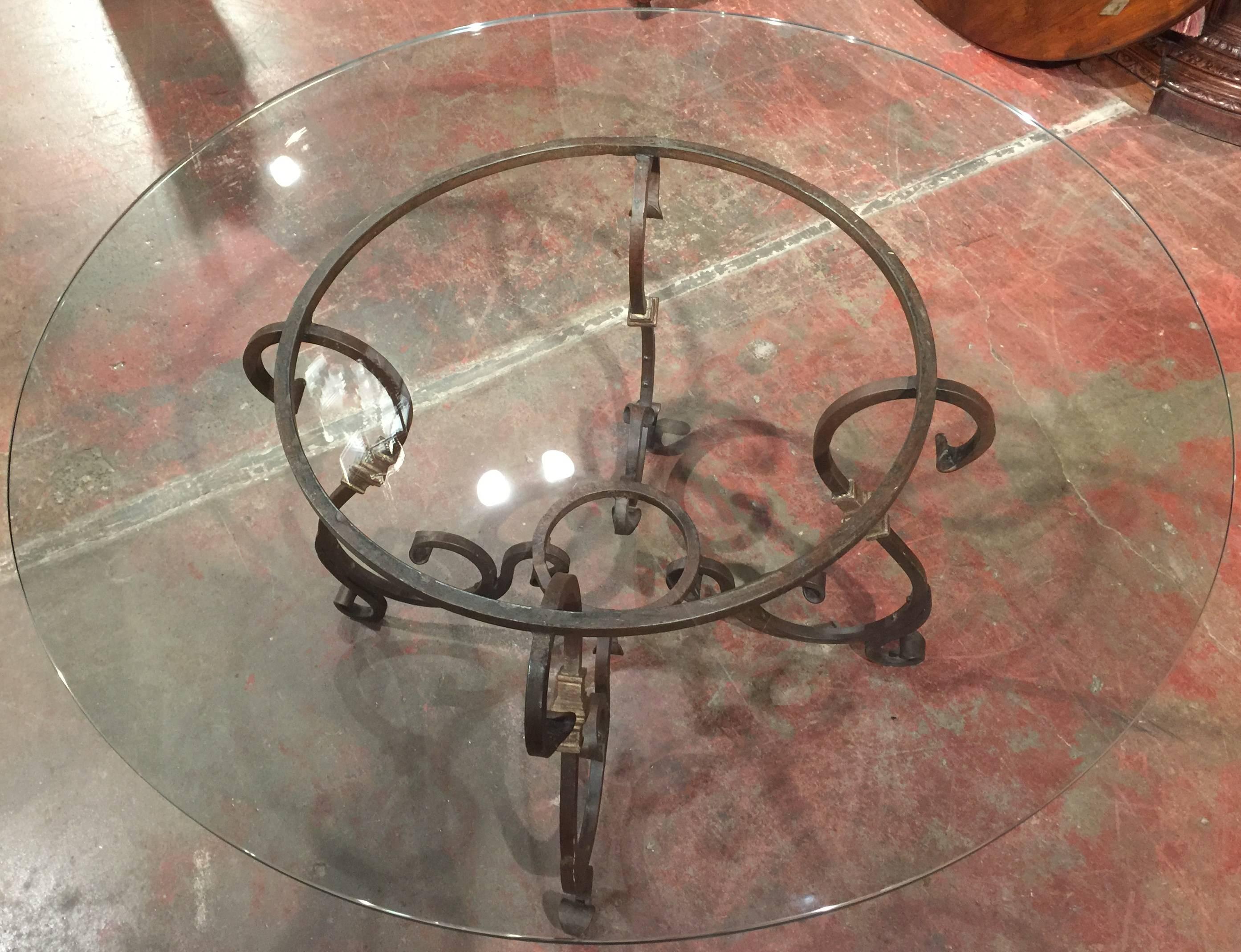 wrought iron table with glass top