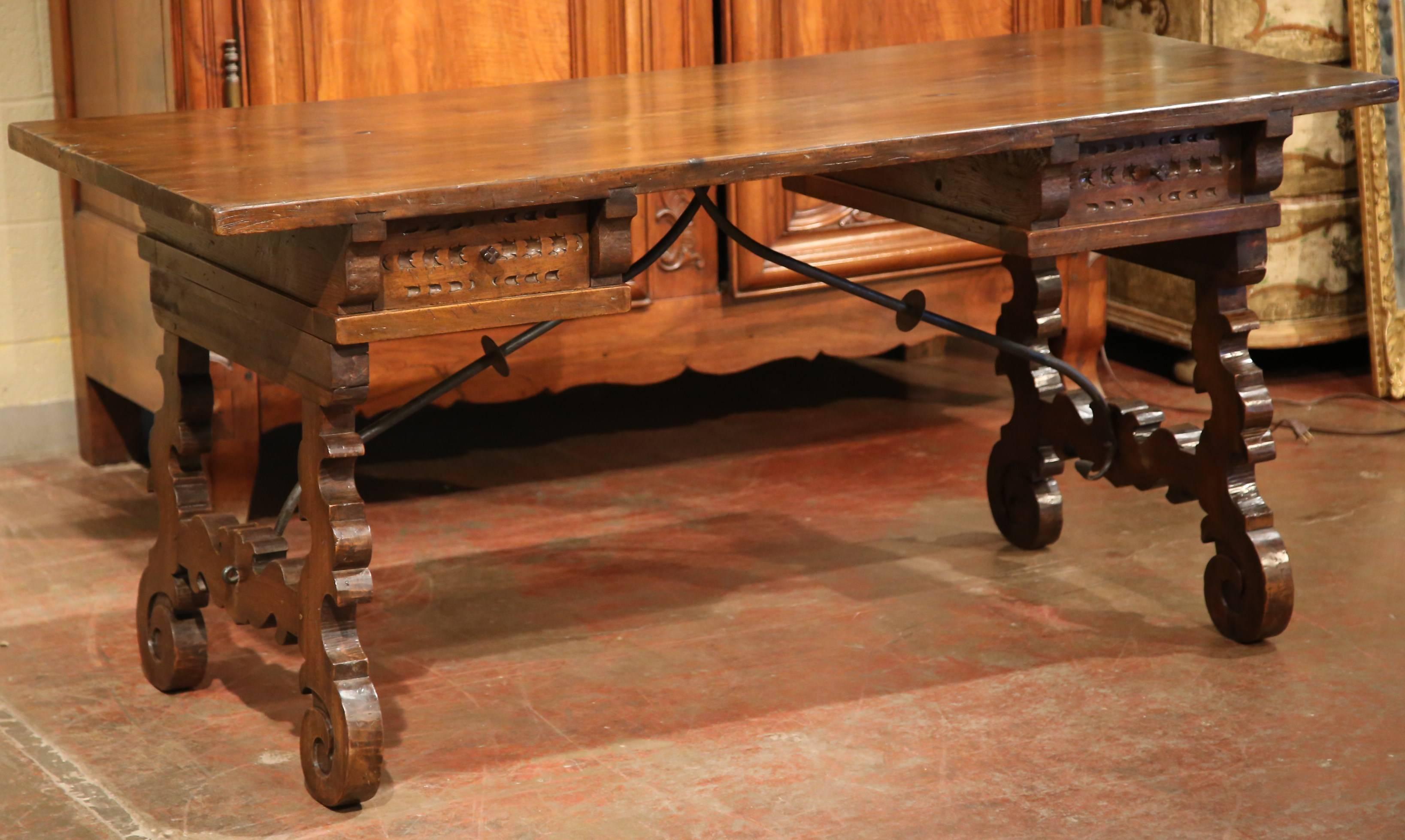 Forged Early 20th Century Spanish Carved Walnut Desk with Wrought Iron Stretcher