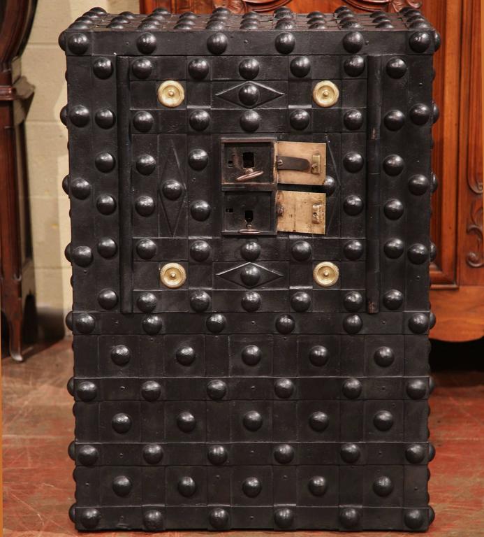 This fabulous Gothic hobnail safe was created in France, circa 1850. The antique was manufactured by Magaud de Charf from Marseilles (1850-1890). The wrought iron safe opens using an intricate and all original mechanism. To open the safe, place the