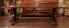 Large Early 20th Century Spanish Oak Table with Iron Stretcher and Carved Legs