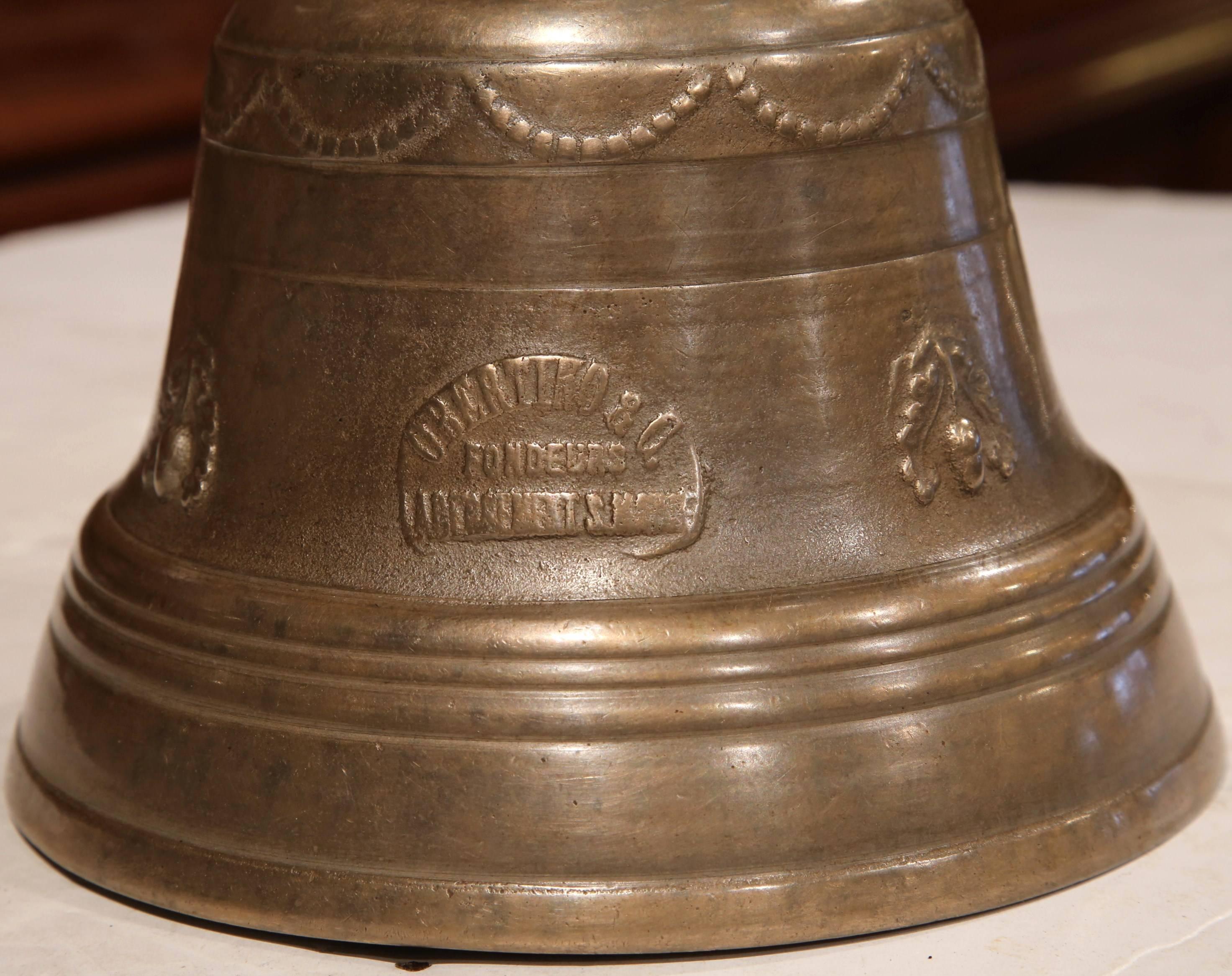Bring the French countryside into your home with this beautiful, patinated bronze bell from the Franche-Comte region of France, crafted, circa 1860, the bell is signed 