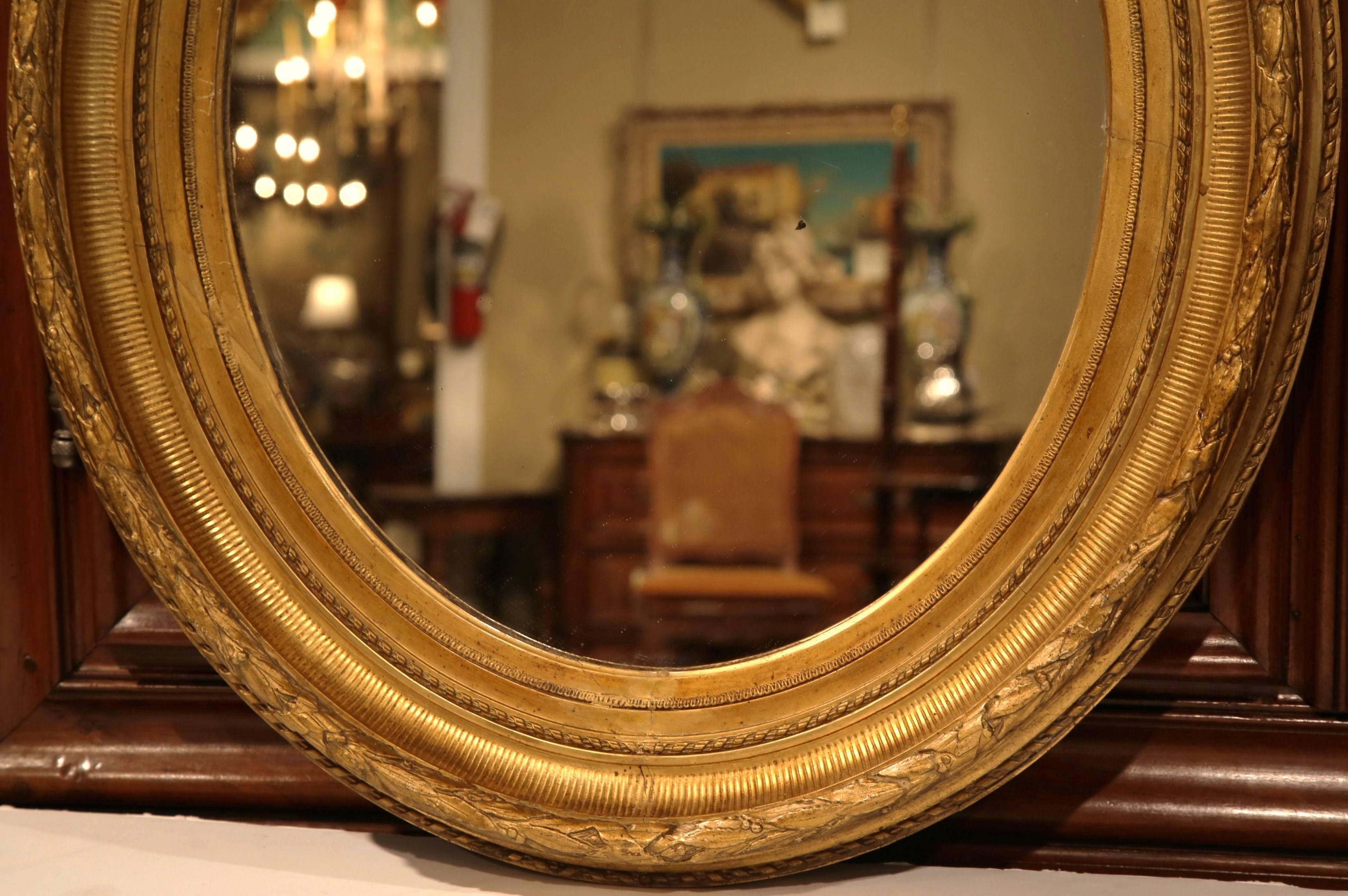 19th Century French Louis XV Carved Giltwood Oval Mirror In Excellent Condition In Dallas, TX