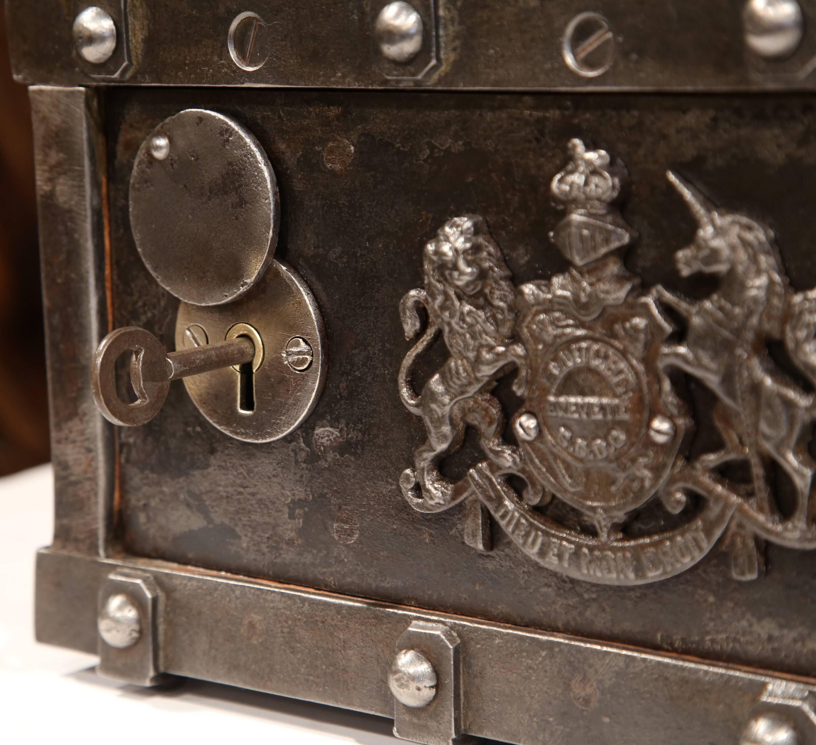 19th Century French Polished Cast Iron Safe with Coat of Arms and Handles 3