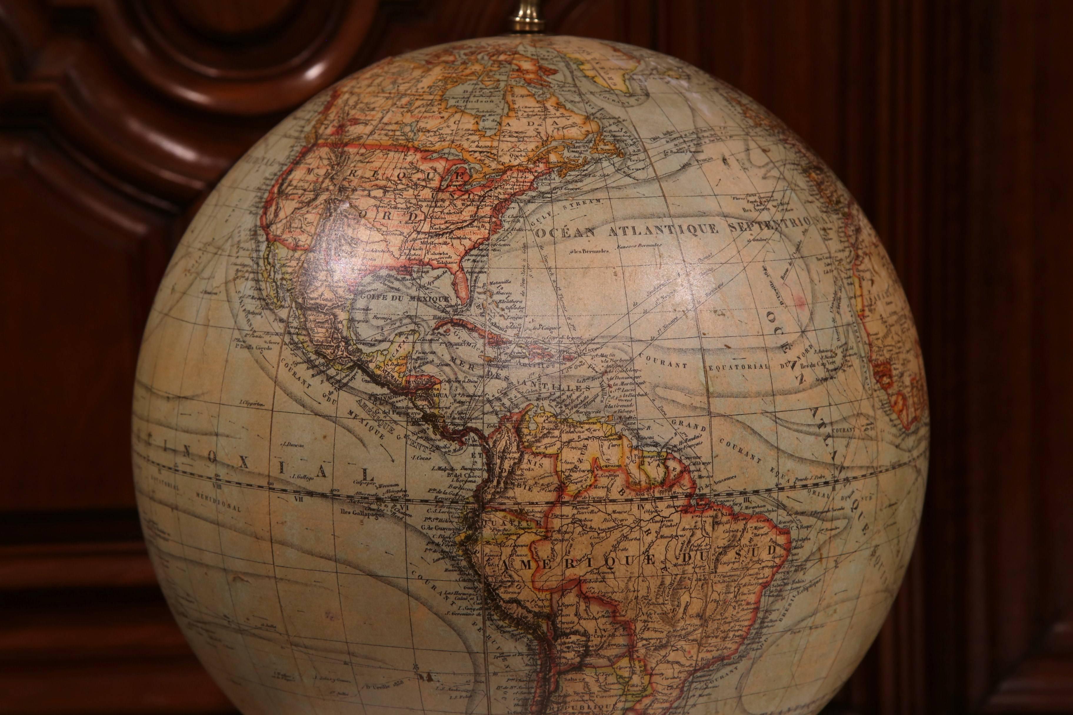 See the world from your study, library or office with this antique globe from France, circa 1900. The historic map sits on a carved, wrought iron base and is signed G. Thomas, Paris.
14