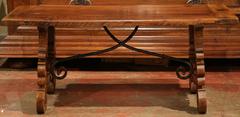 Mid-20th Century Spanish Carved Walnut Coffee Table with Iron Stretchers