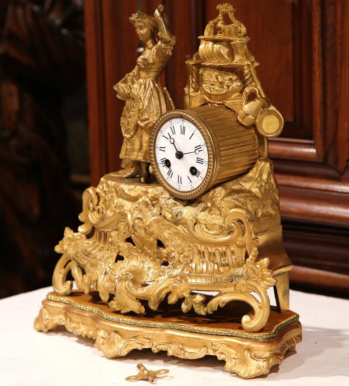 19th Century French GoldPlated Mantel Clock with Carved Wooden Gold