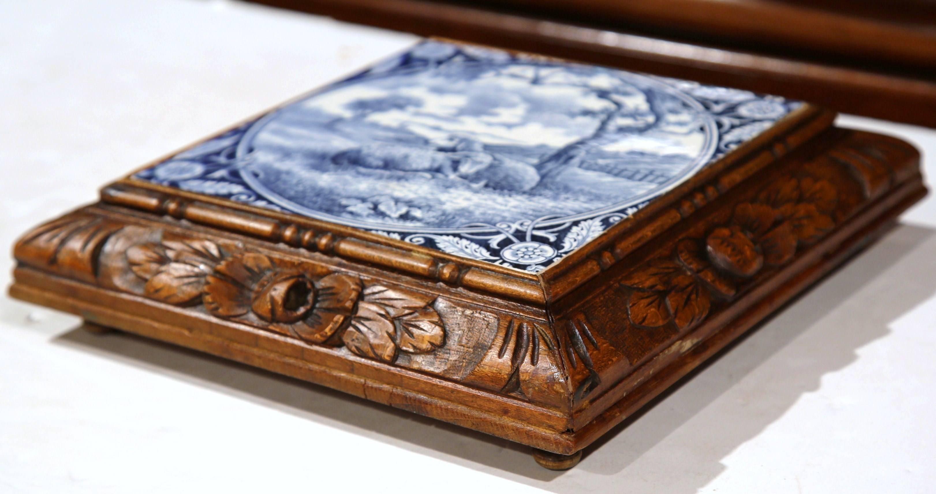 Hand-Carved 19th Century French Carved Hot Dish Tray with Blue and White Delft Plaque