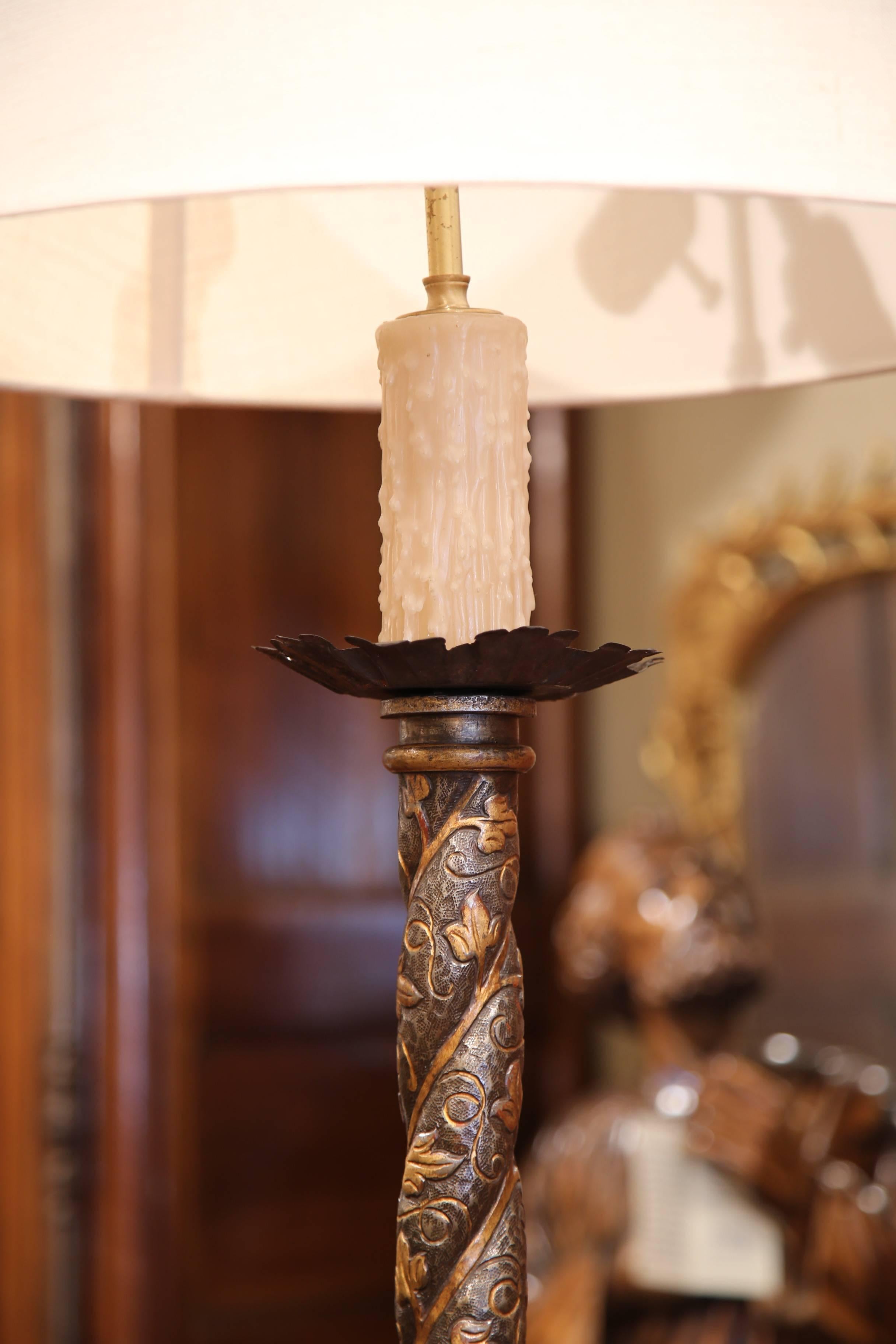 Add extra light next to your favorite reading chair in the living room or study with this elegant, antique floor lamp from Southern France, circa 1860. On the tall base, the lamp has painted and gilt flowers that are discrete but perfectly
