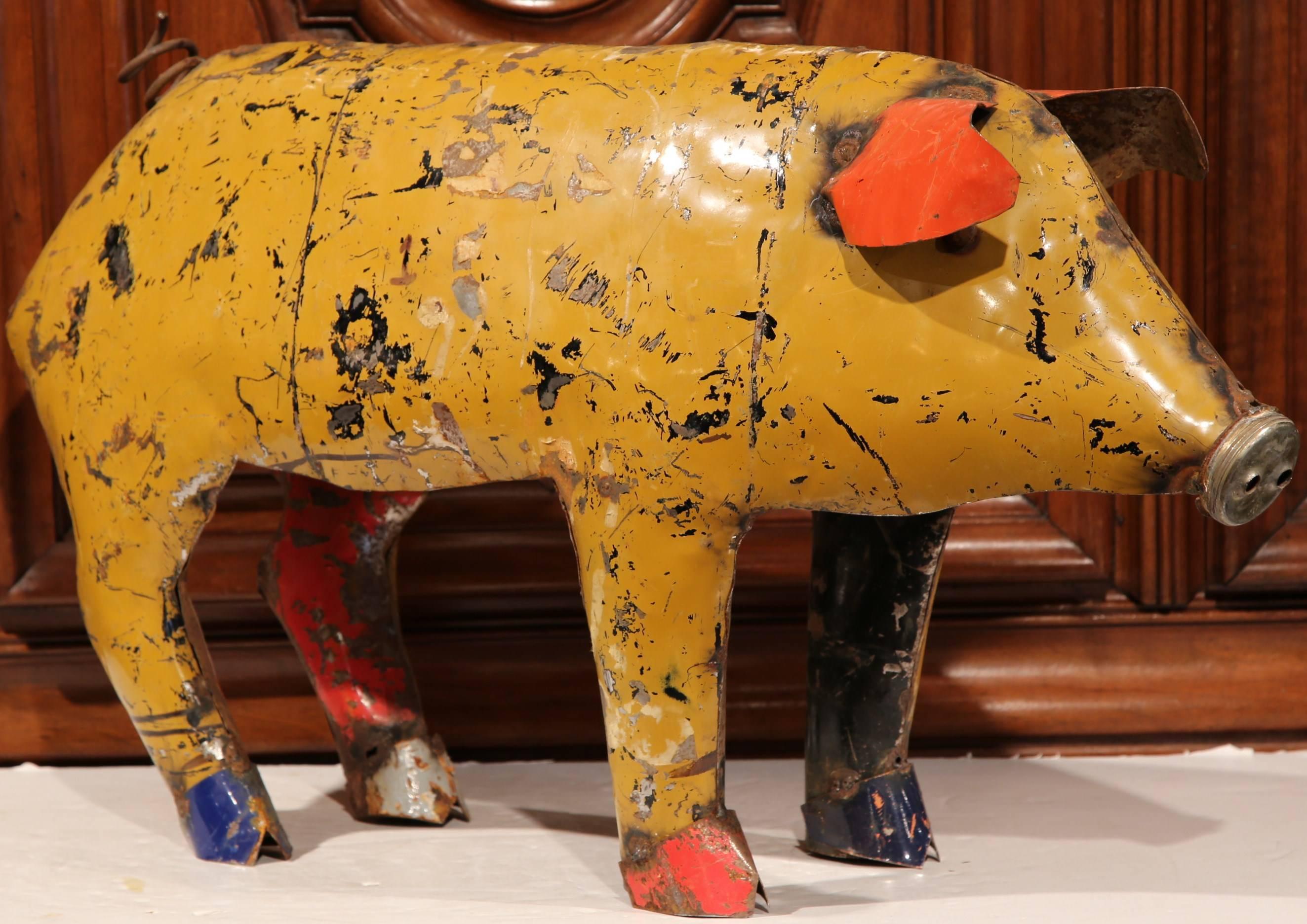 Add French countryside charm to your home with this interesting pig sculpture from Southern France. The farm animal is crafted from old metal elements, and is finished with its original paint. This piece would make a fun, colorful addition for any