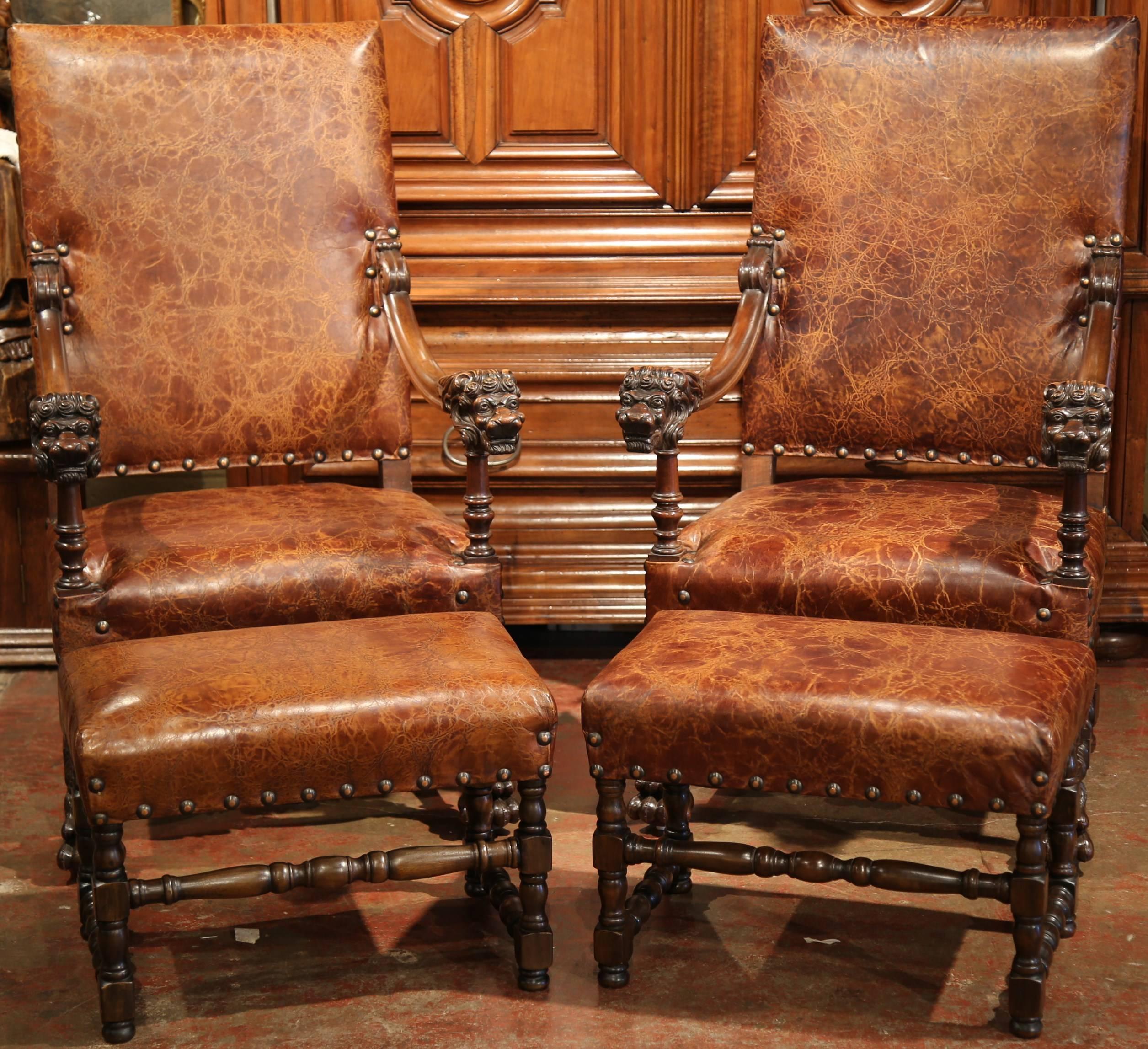 Add extra comfort to your living room with this large pair of antique armchairs from Southern France. Carved circa 1870, the armchairs are not only statements of style, but are also built for comfort and are paired with matching ottomans. On the