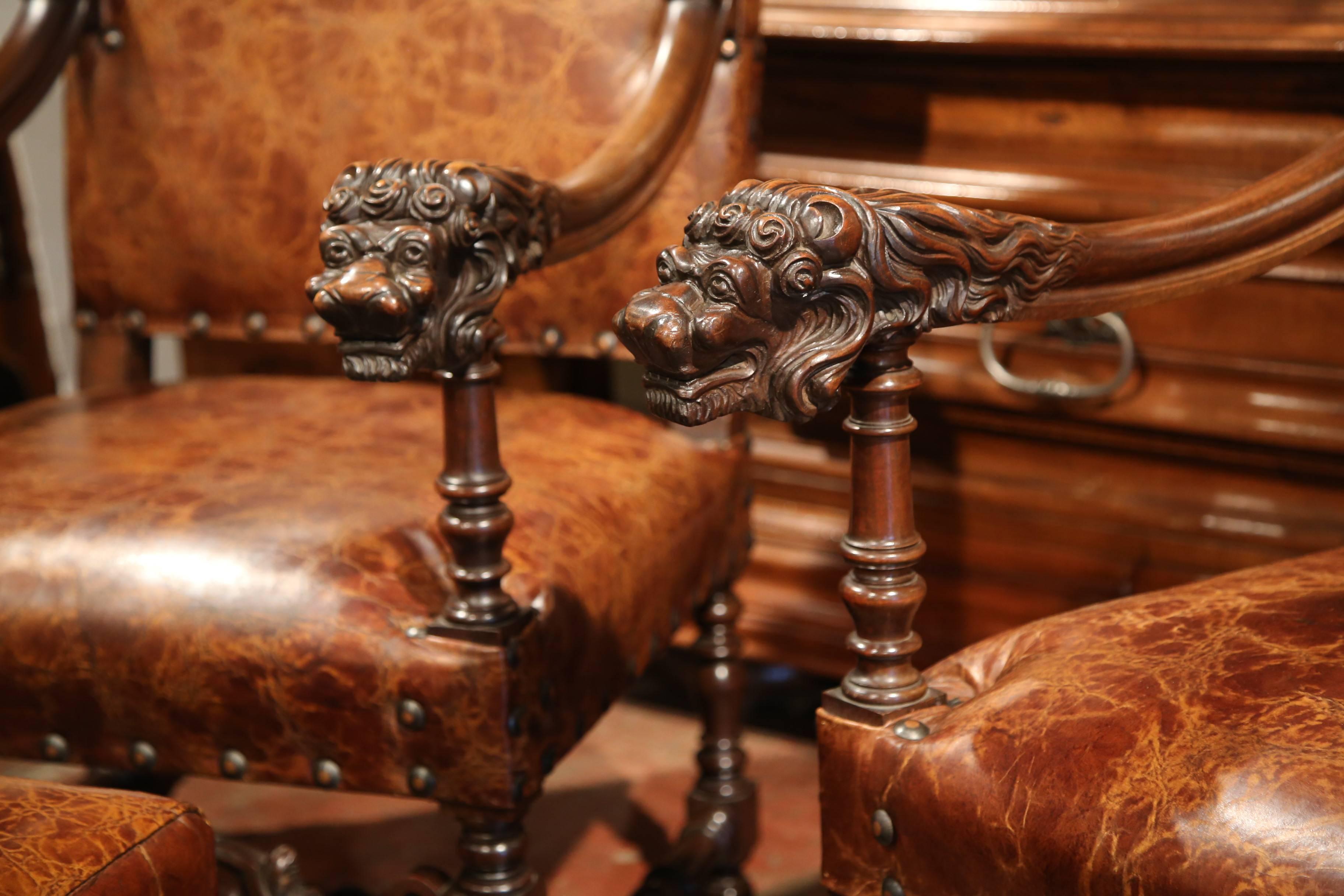 Hand-Carved Pair of 19th Century French Louis XIII Walnut Lion Heads Armchairs with Ottomans