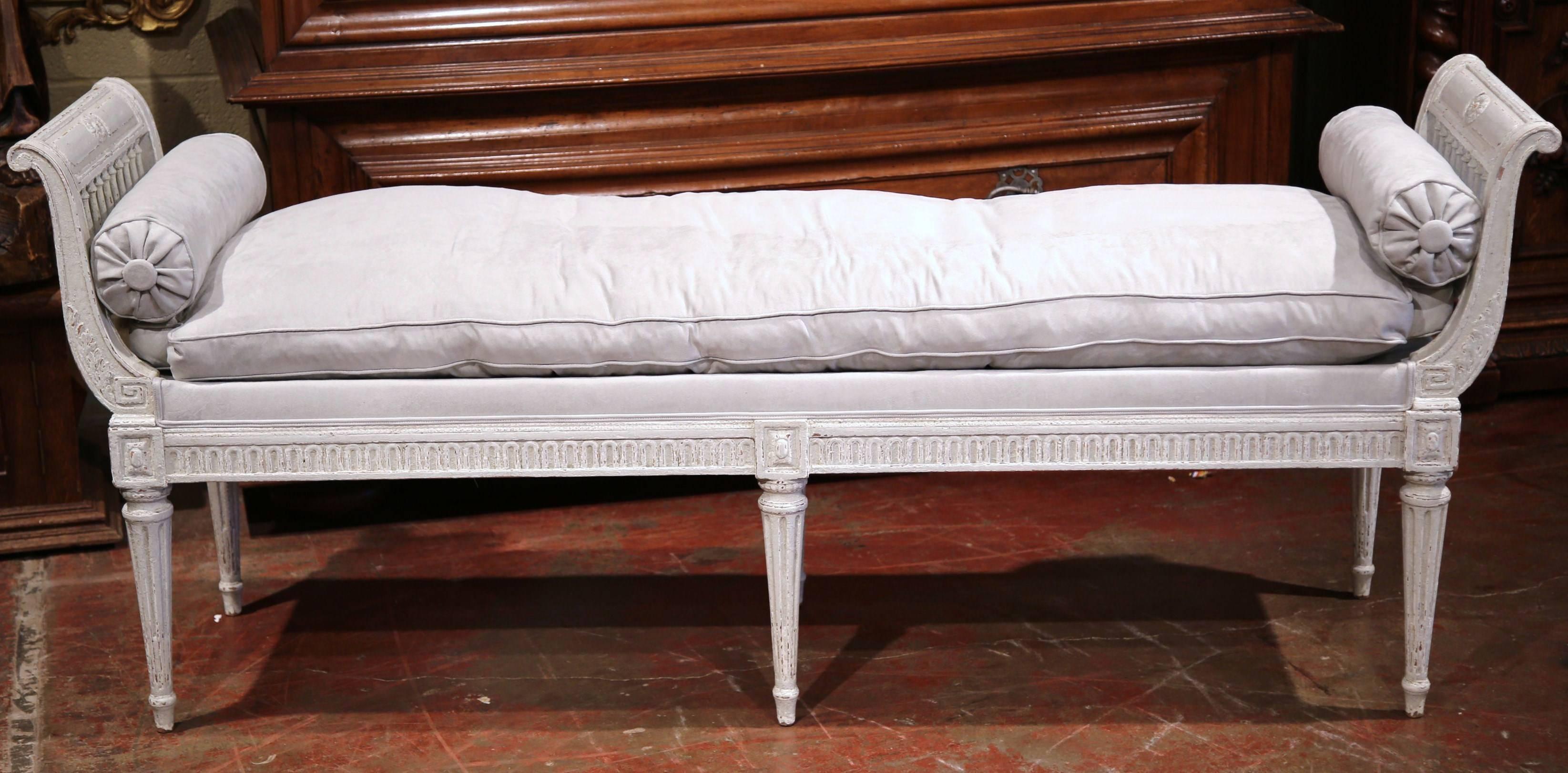 Place this elegant antique six-leg bench at the foot of a king-size bed or in your living room for extra, versatile seating. Crafted in France, circa 1880, the traditional banquette features a curved back with spinals, detailed Greek keys carvings
