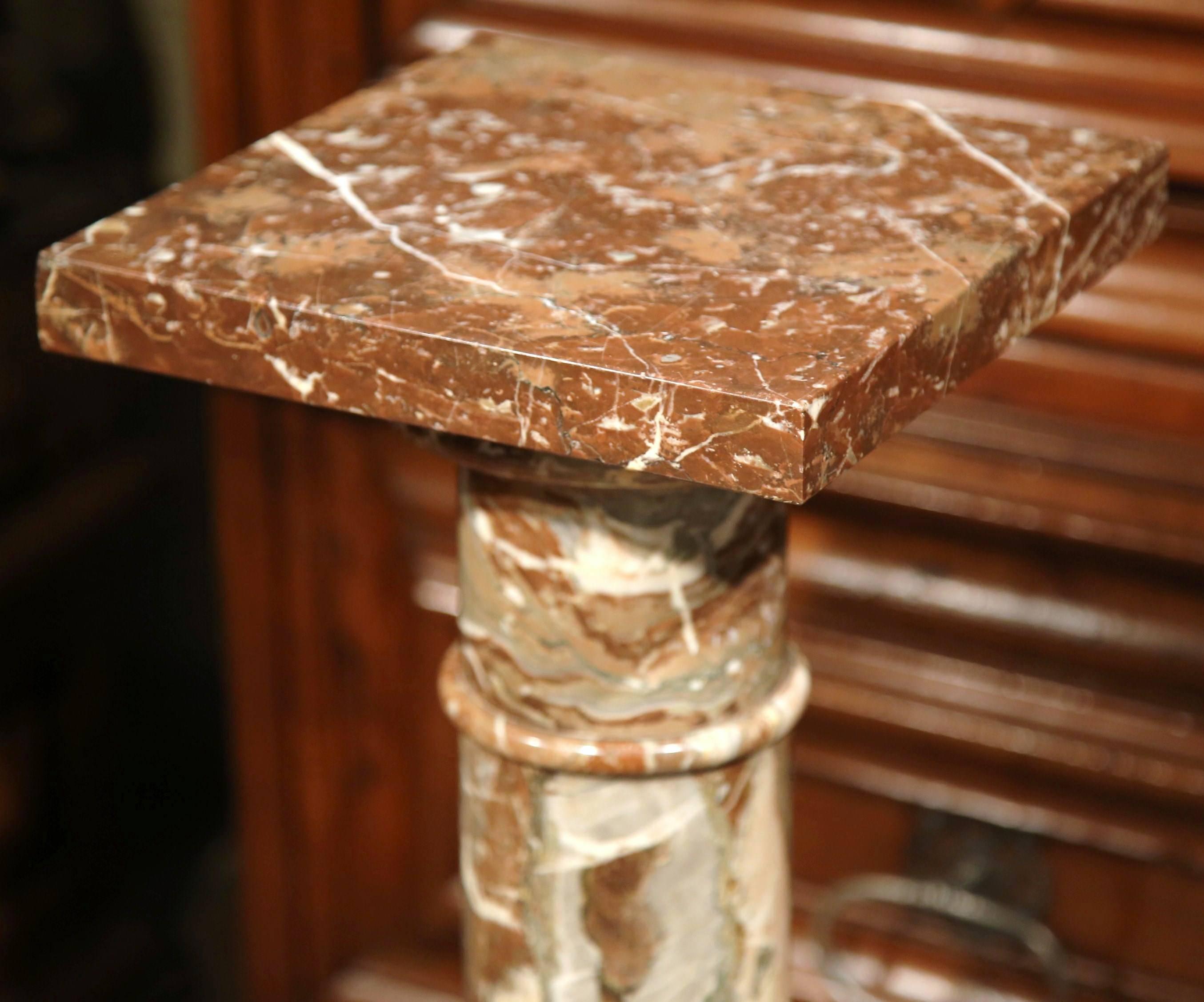 This elegant, antique carved marble pedestal was sculpted in France, circa 1870. The traditional marble piece sits on a sturdy, square plinth base, and features a round stem with a square swivel top to hold a bust or a sculpture. This classical