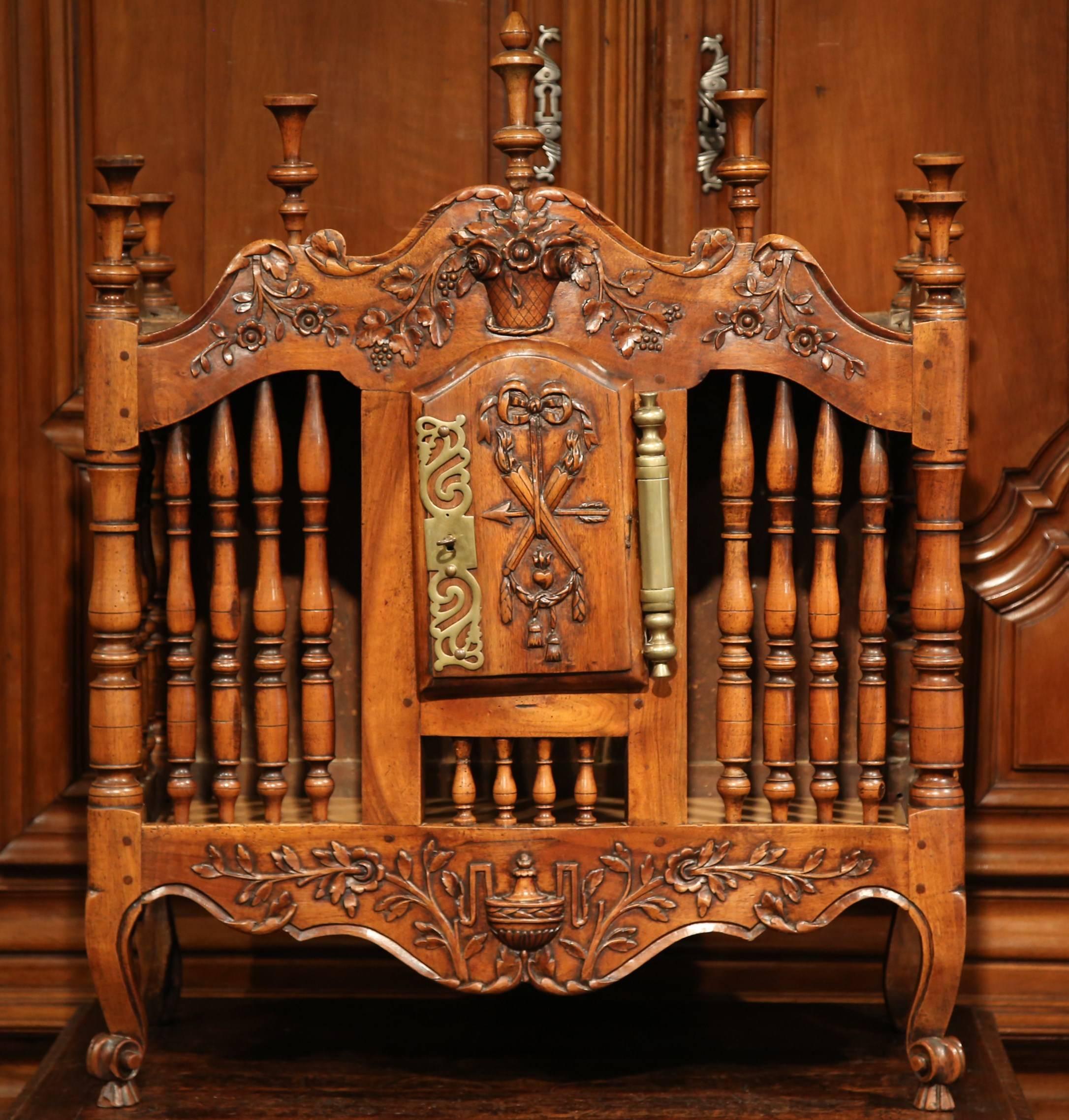 This exquisite, antique fruitwood panetiere was carved in Southern France, circa 1850. In 18th century Provence, the panetiere (or bread box), was used as a practical wall cabinet in which freshly made bread was stored. The decorative cabinet is