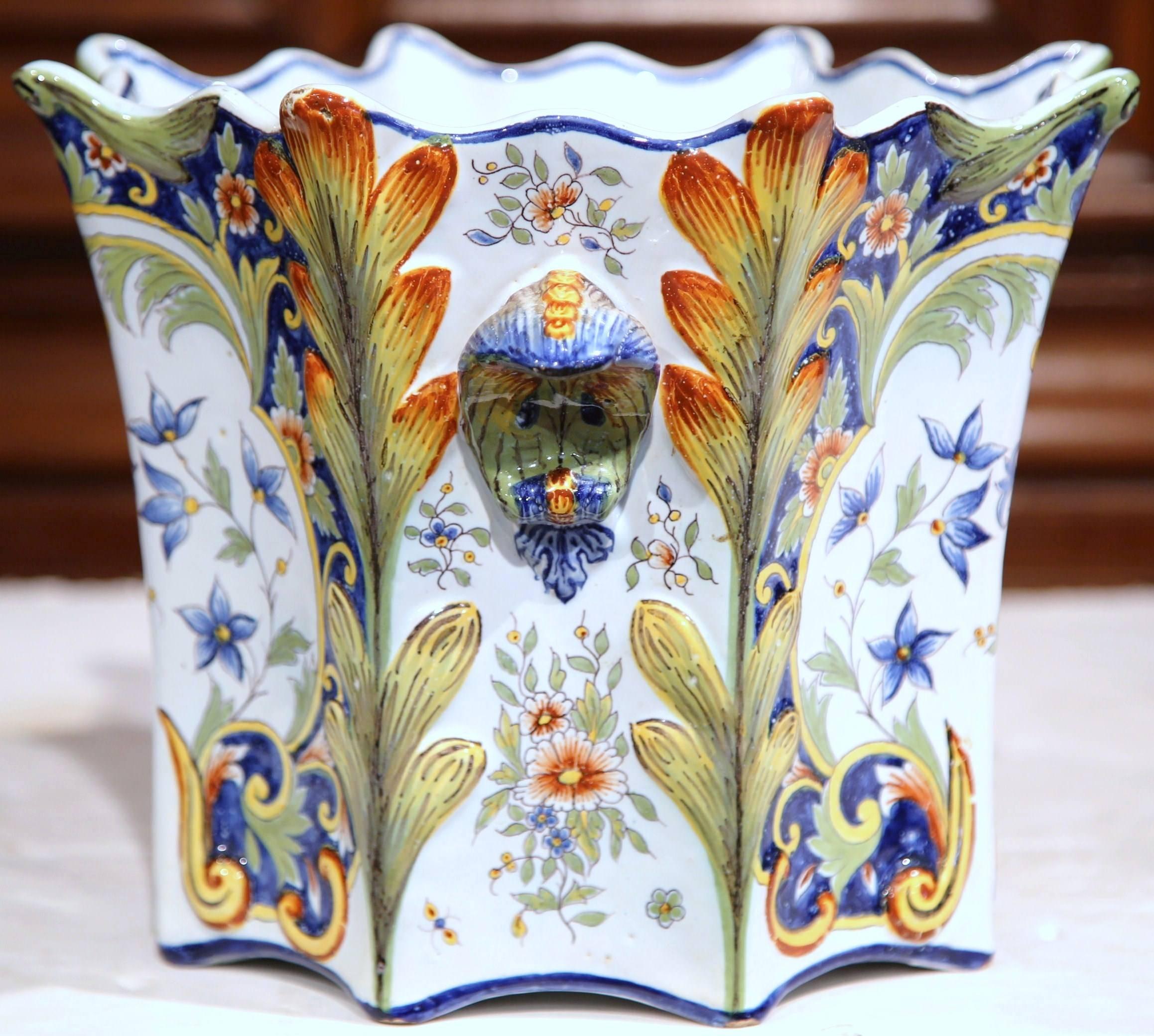 Decorate a mantle, table or buffet with this beautiful and colorful antique octagonal planter with handles. Sculpted in Normandy, France, circa 1880, the porcelain cache-pot has a playful, unique shape and a beautiful palette of rich colors.