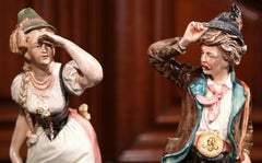 Paire de figurines en porcelaine allemande du 19ème siècle peintes à la main