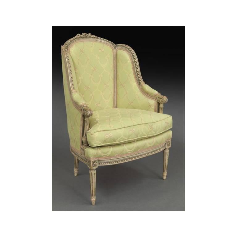 This elegant antique duchesse brisee was crafted in France, circa 1880. The three-piece chaise longue has tapered legs and detailed carvings. The set has two armchairs (his and hers), with a matching ottoman. The seats have their original rubbed
