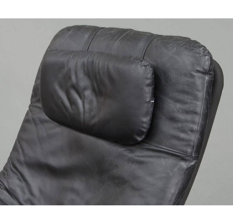 Contemporary Black Leather and Wood Reclining Armchair with Headrest In Excellent Condition In Dallas, TX