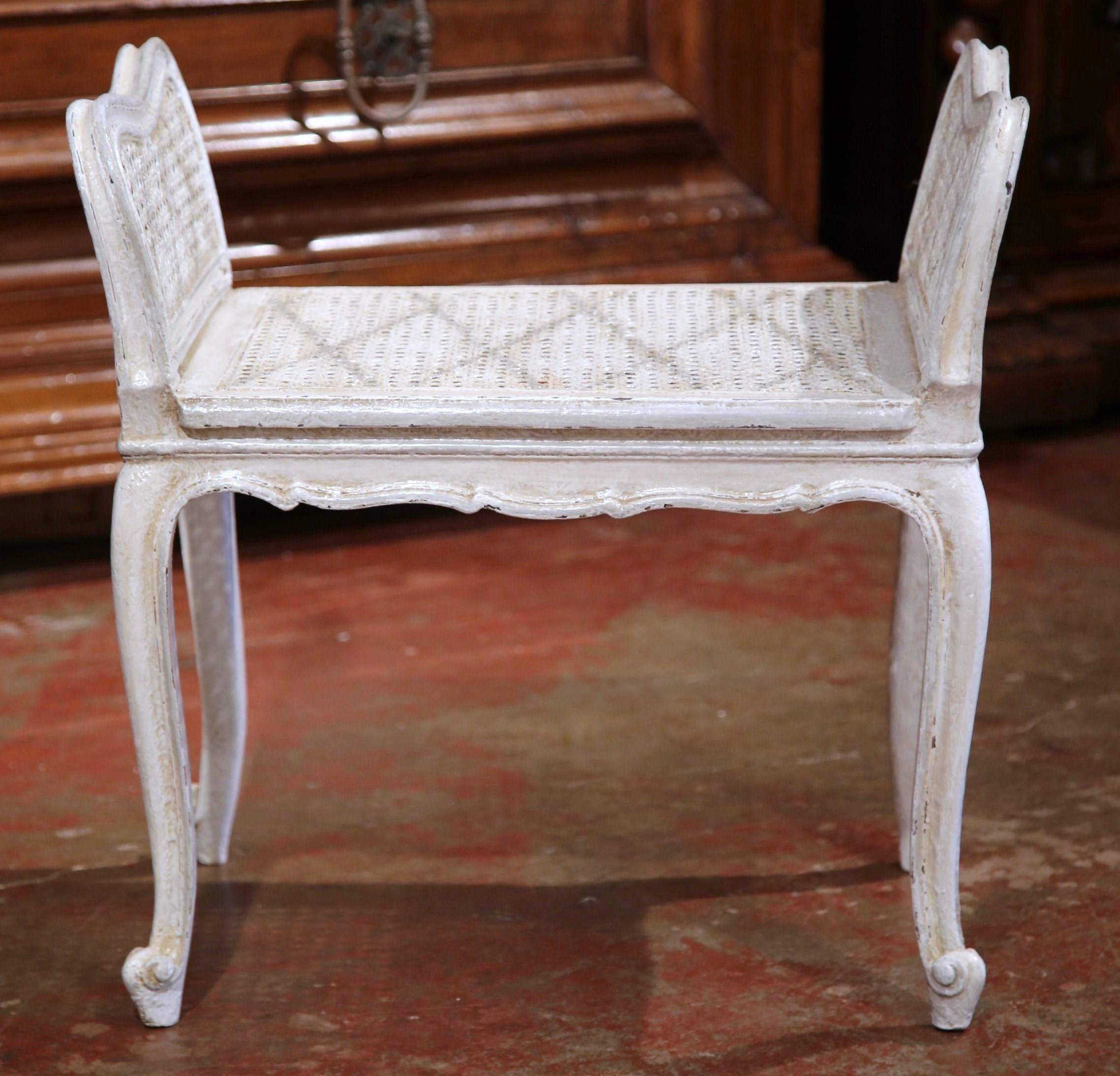 Early 20th Century French Louis XV Carved Painted Bench with Cane Seating 1