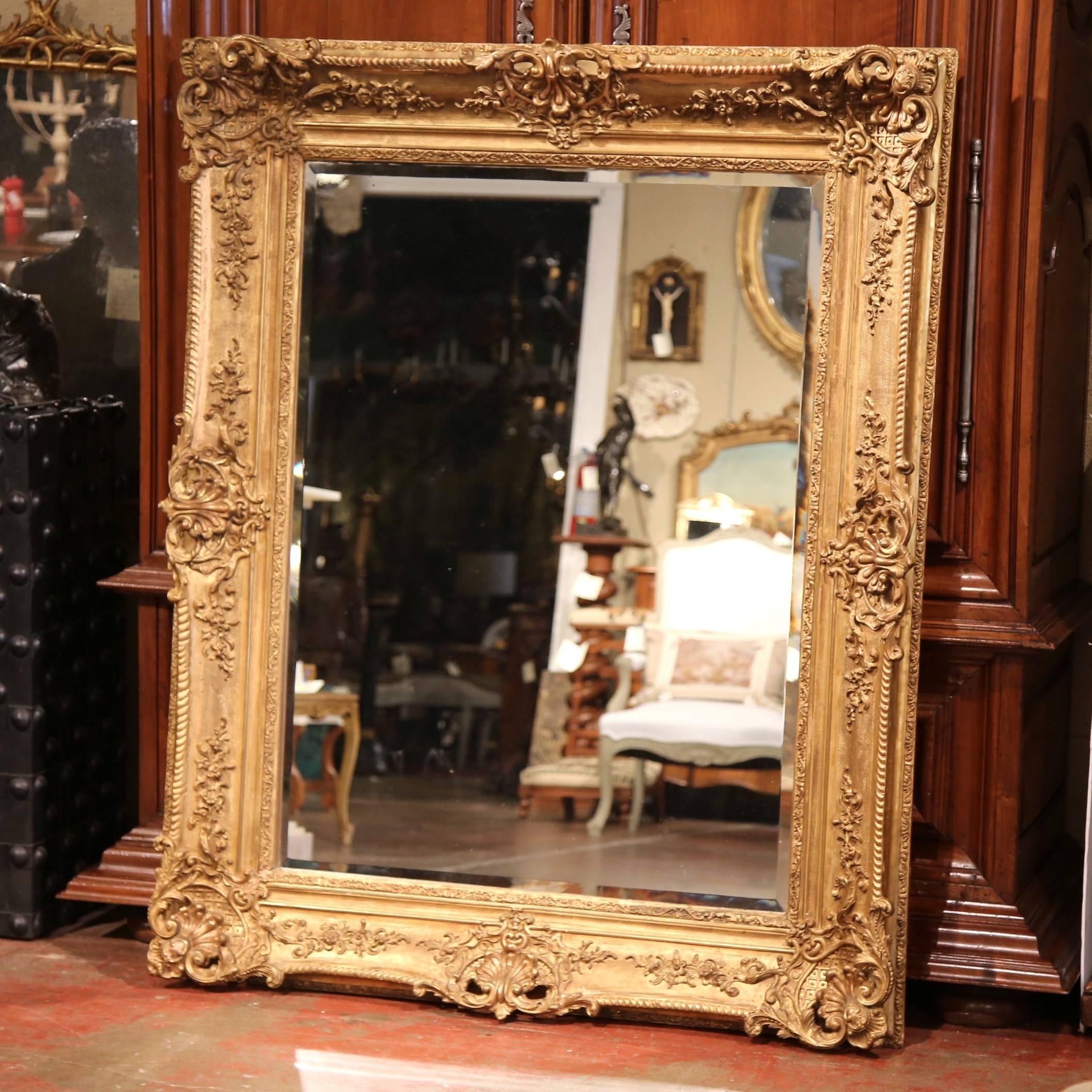 19th Century French Louis XV Carved Giltwood Mirror with Floral and Shell Decor 1