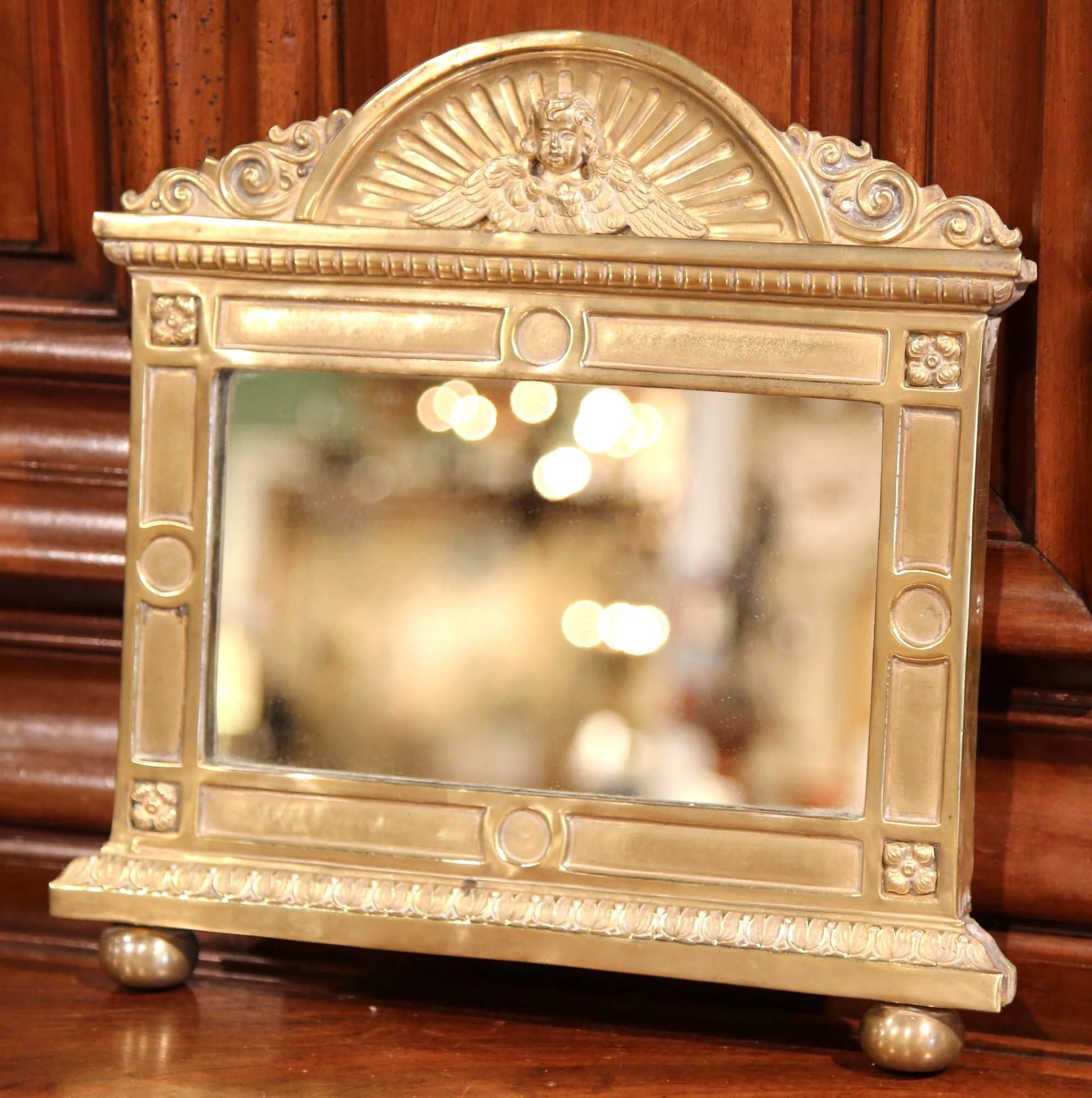 Hand-Crafted 19th Century French Repousse Brass Wall Mirror with Cherub Face Decor For Sale