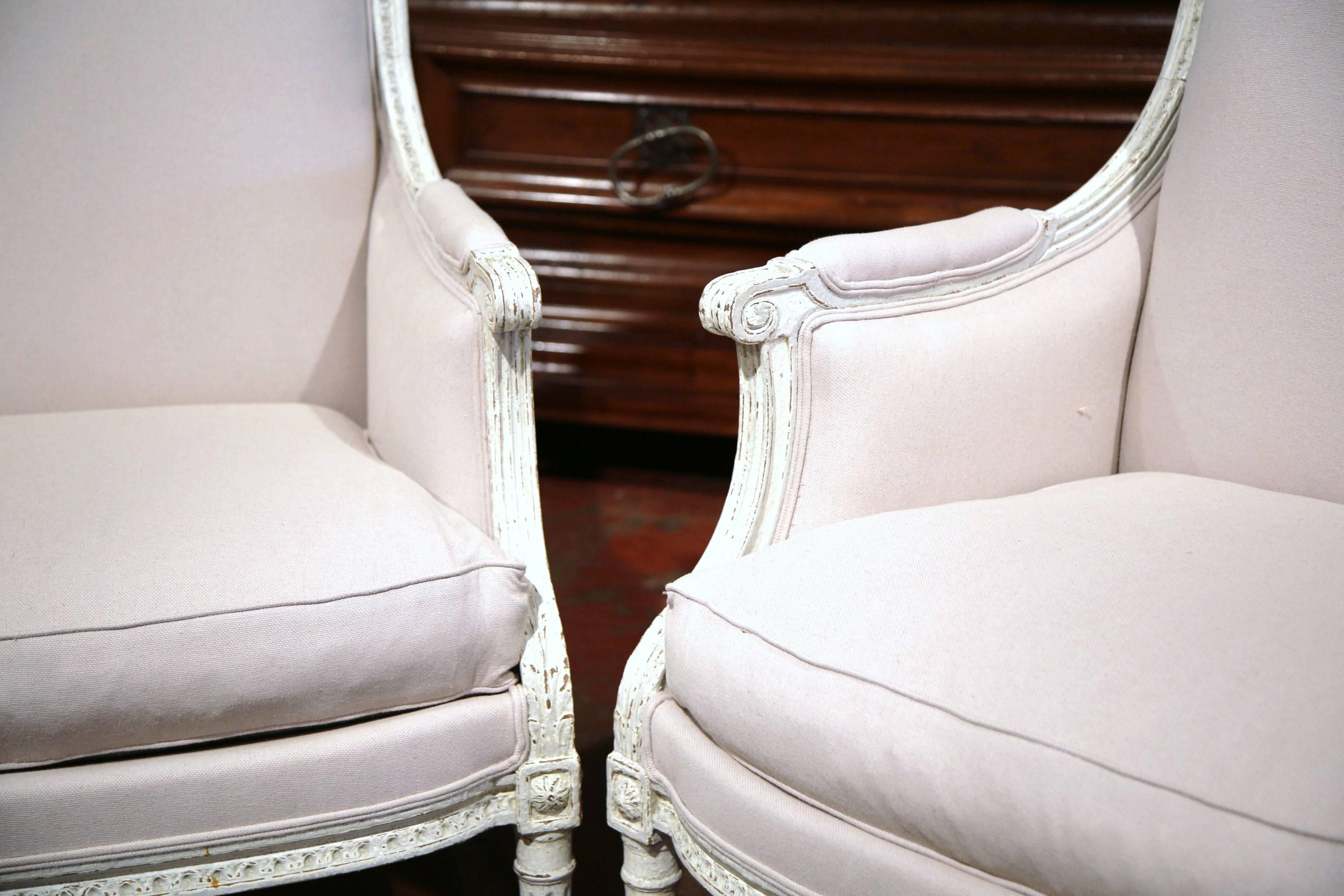 Patinated Pair of 19th Century French Louis XVI Carved Painted Armchairs with Beige Fabric