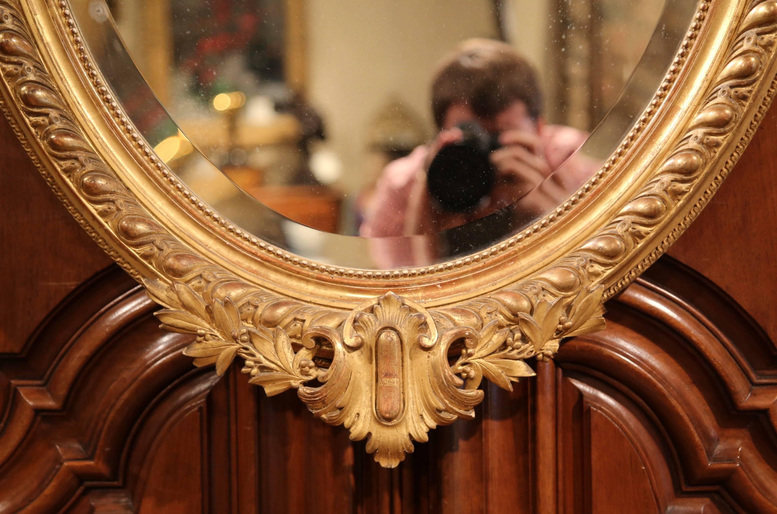 Beveled 19th Century French Louis XV Carved Giltwood Oval Mirror with Shell Cartouche