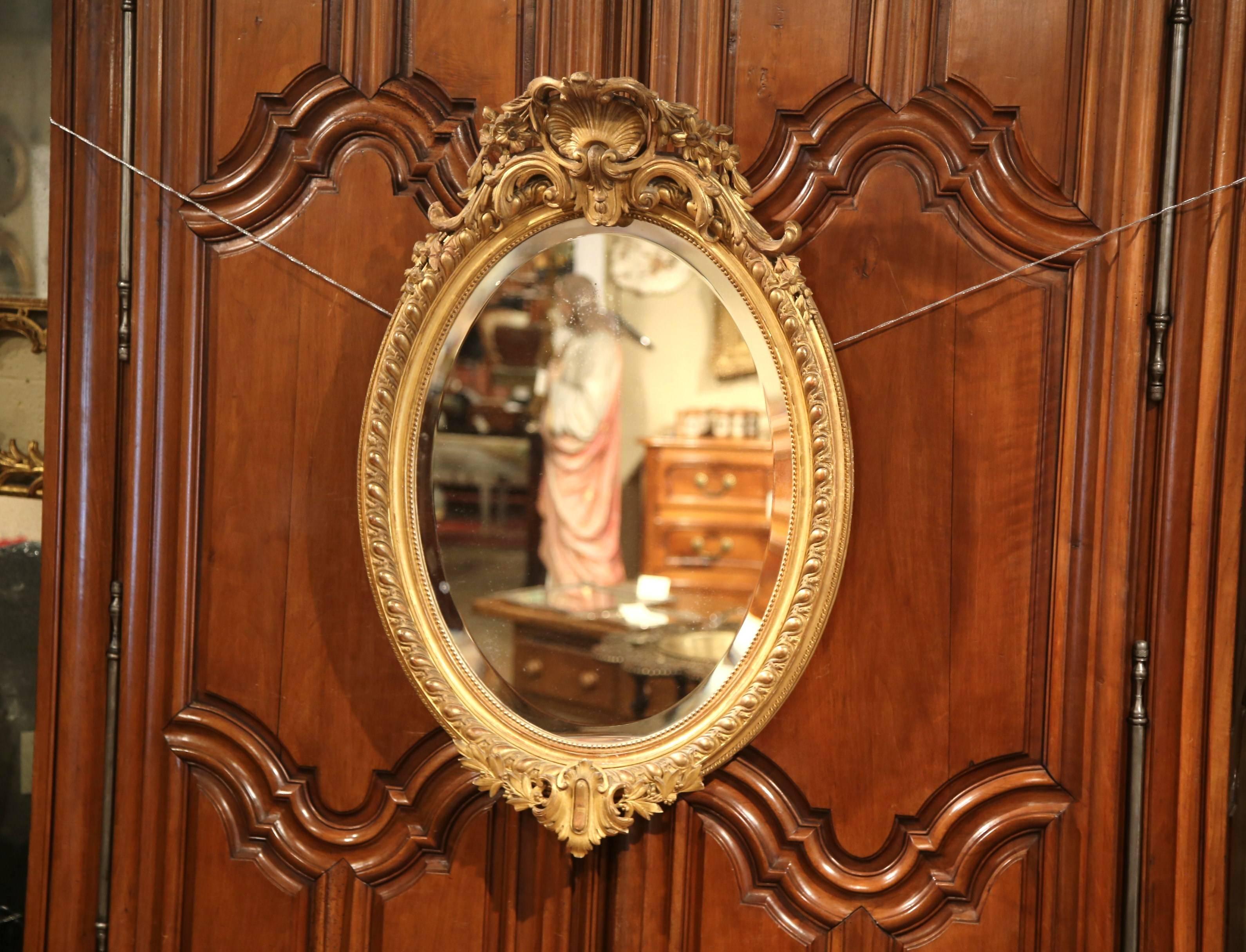 Mercury Glass 19th Century French Louis XV Carved Giltwood Oval Mirror with Shell Cartouche