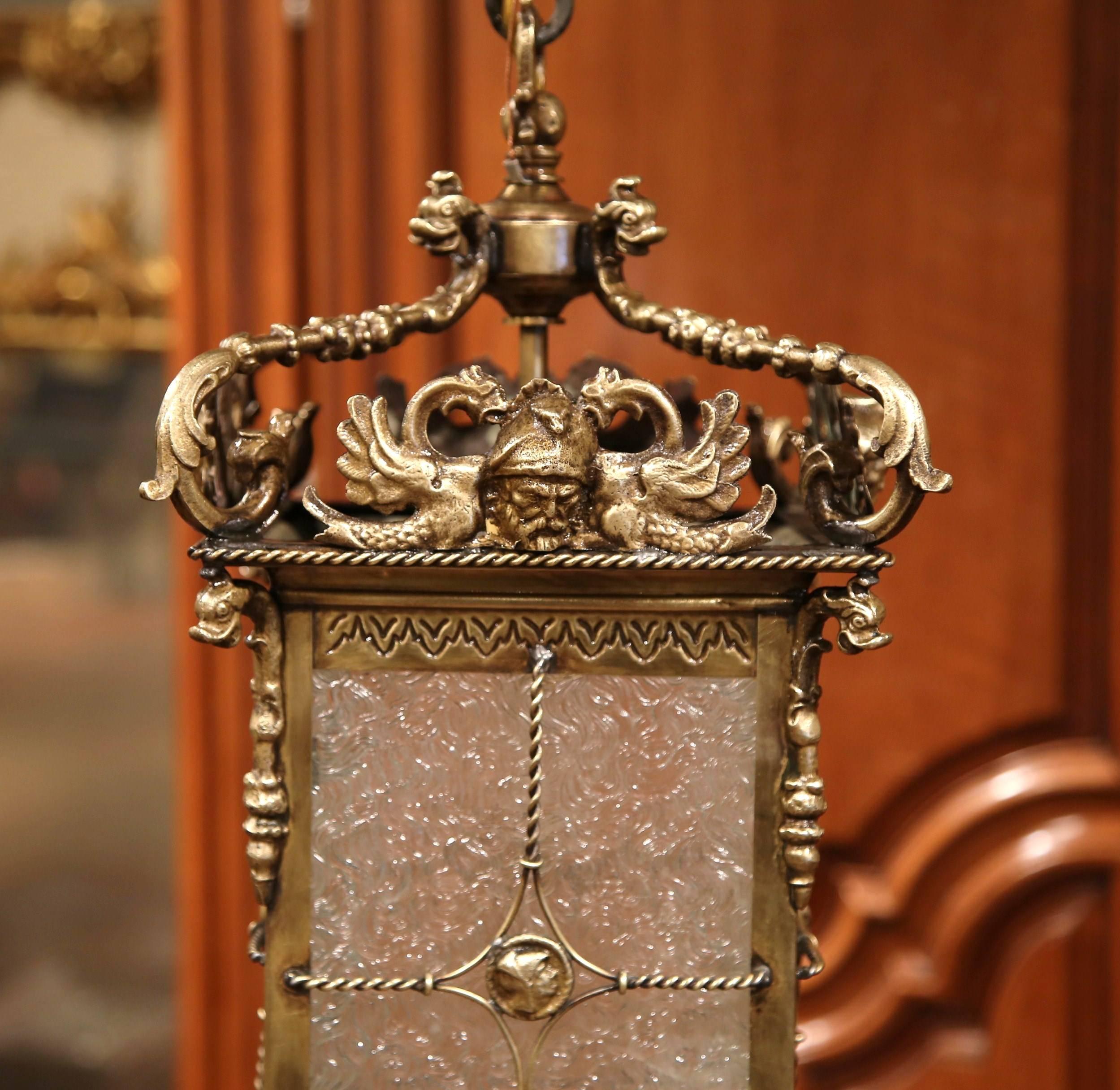 Hand-Crafted 19th Century French Bronze Lantern with Roman Faces and Dolphins Mounts